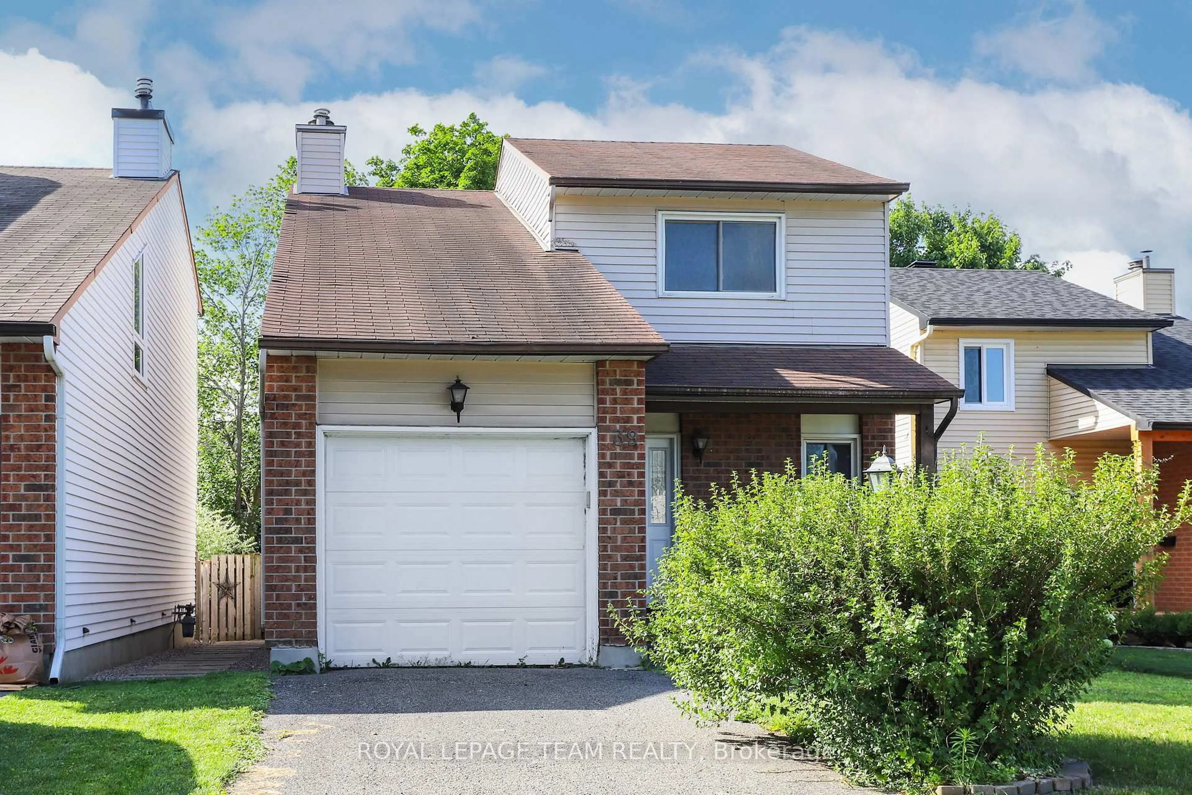 Home with vinyl exterior material, street for 39 Benlark Rd, Barrhaven Ontario K2J 2L5
