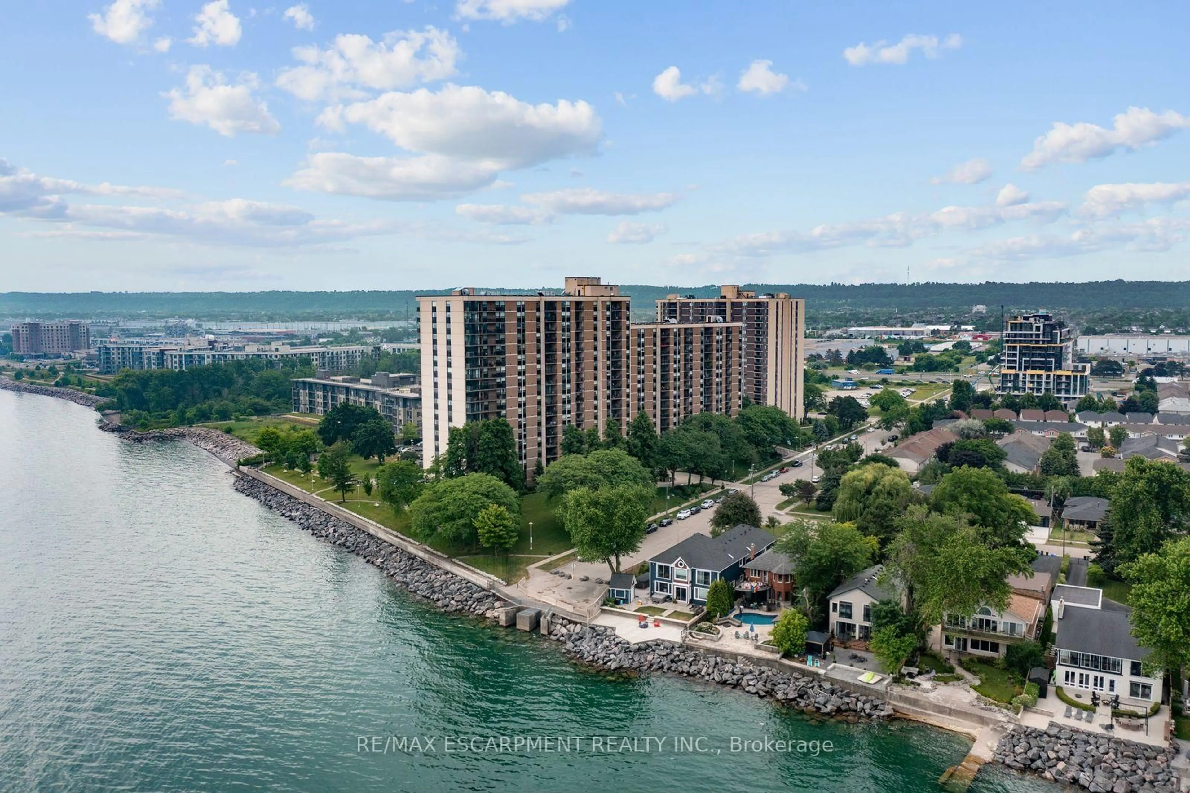 A pic from outside/outdoor area/front of a property/back of a property/a pic from drone, water/lake/river/ocean view for 500 GREEN Rd #218, Hamilton Ontario L8E 3M6