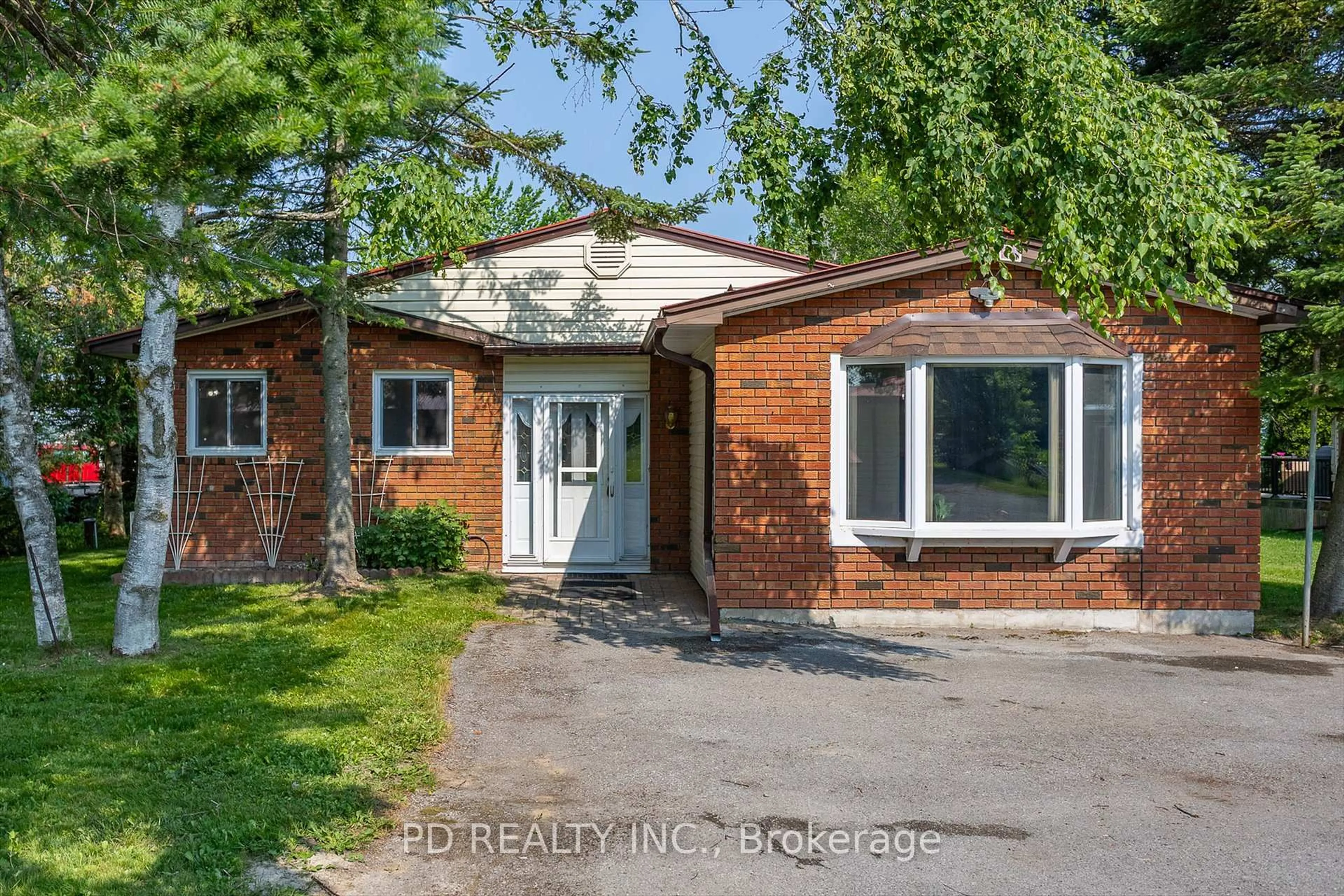 Home with brick exterior material, street for 169 Kenedon Dr, Kawartha Lakes Ontario K0L 2W0