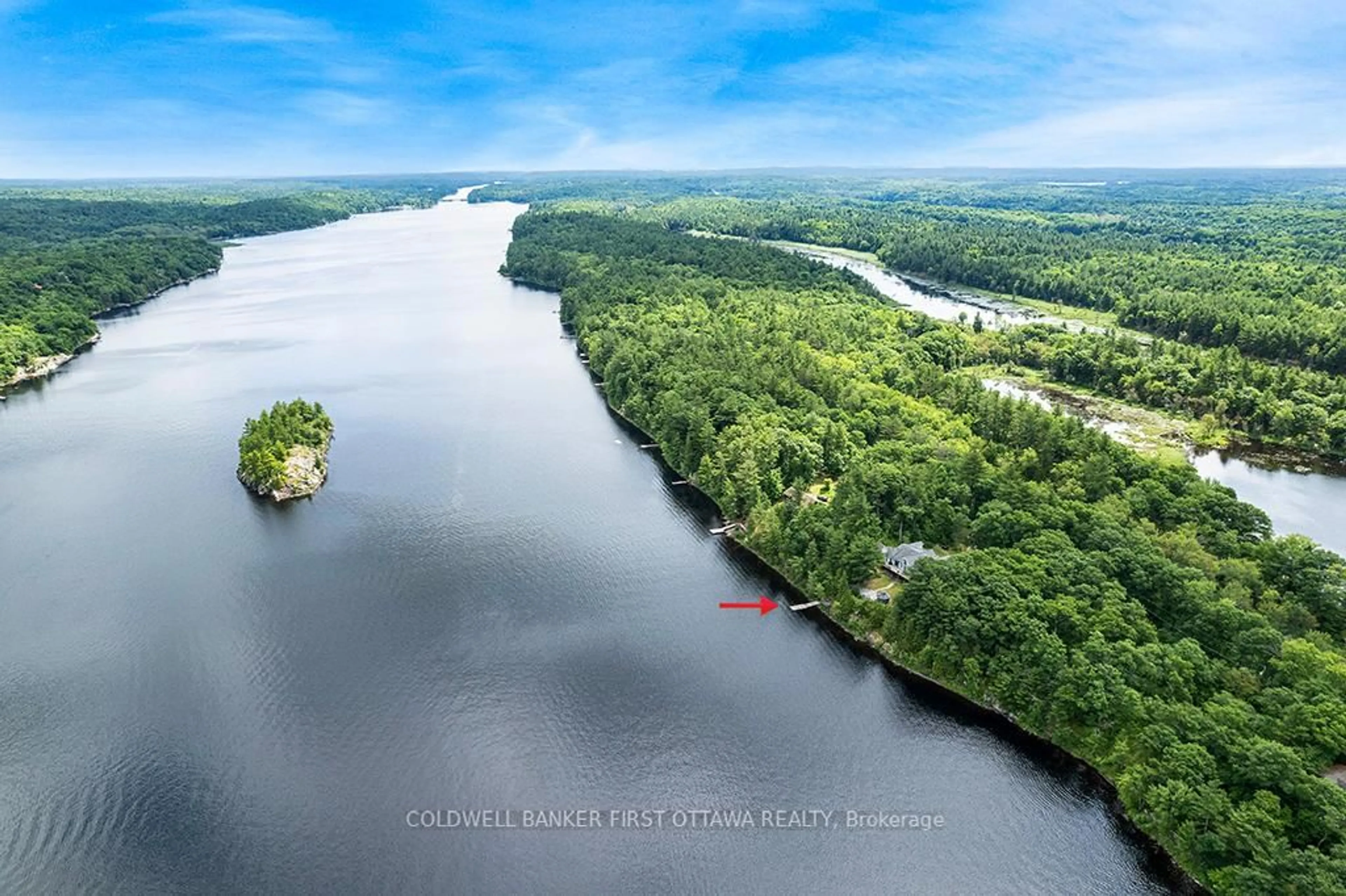 A pic from outside/outdoor area/front of a property/back of a property/a pic from drone, water/lake/river/ocean view for 1718 Blue Heron Rdge, Arden Ontario K0H 1B0