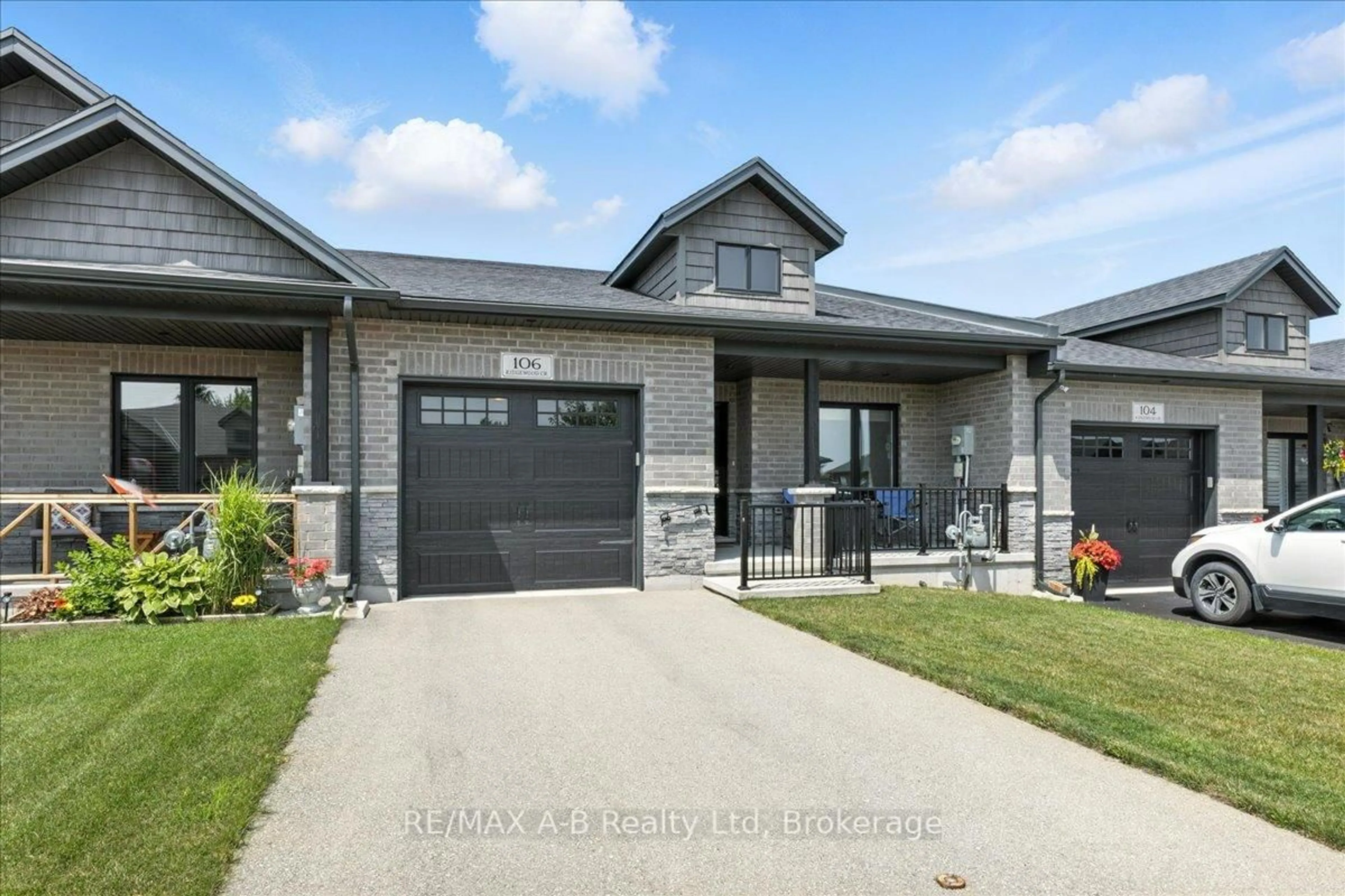 Home with brick exterior material, street for 106 Ridgewood Cres, St. Marys Ontario N4X 1E8