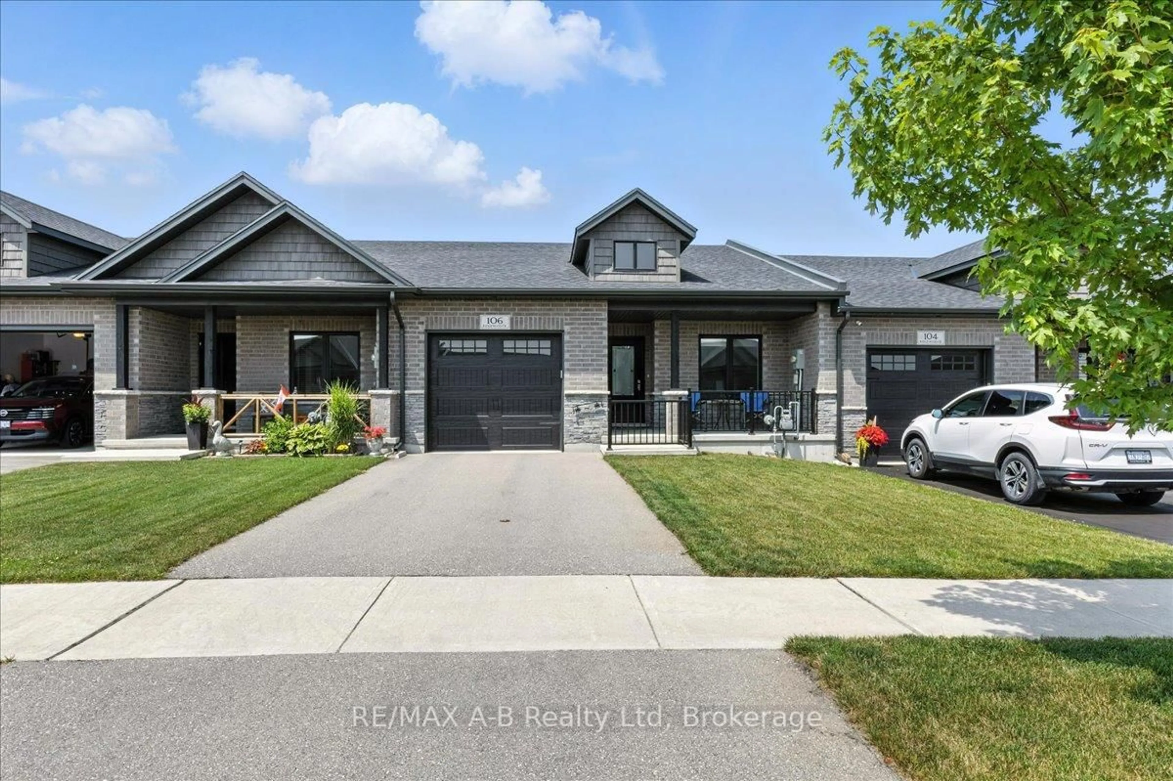 Home with brick exterior material, street for 106 Ridgewood Cres, St. Marys Ontario N4X 1E8