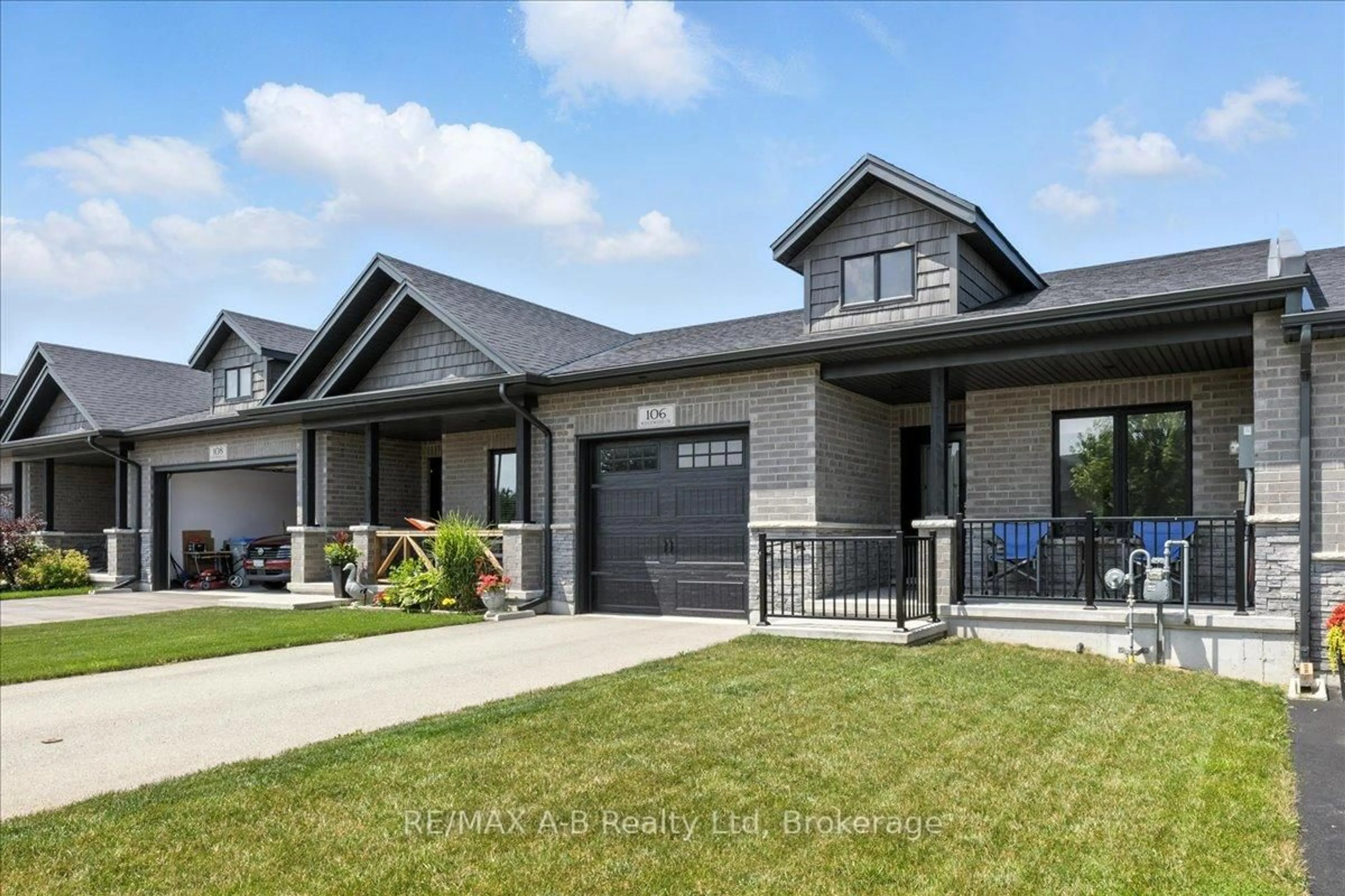Home with brick exterior material, street for 106 Ridgewood Cres, St. Marys Ontario N4X 1E8