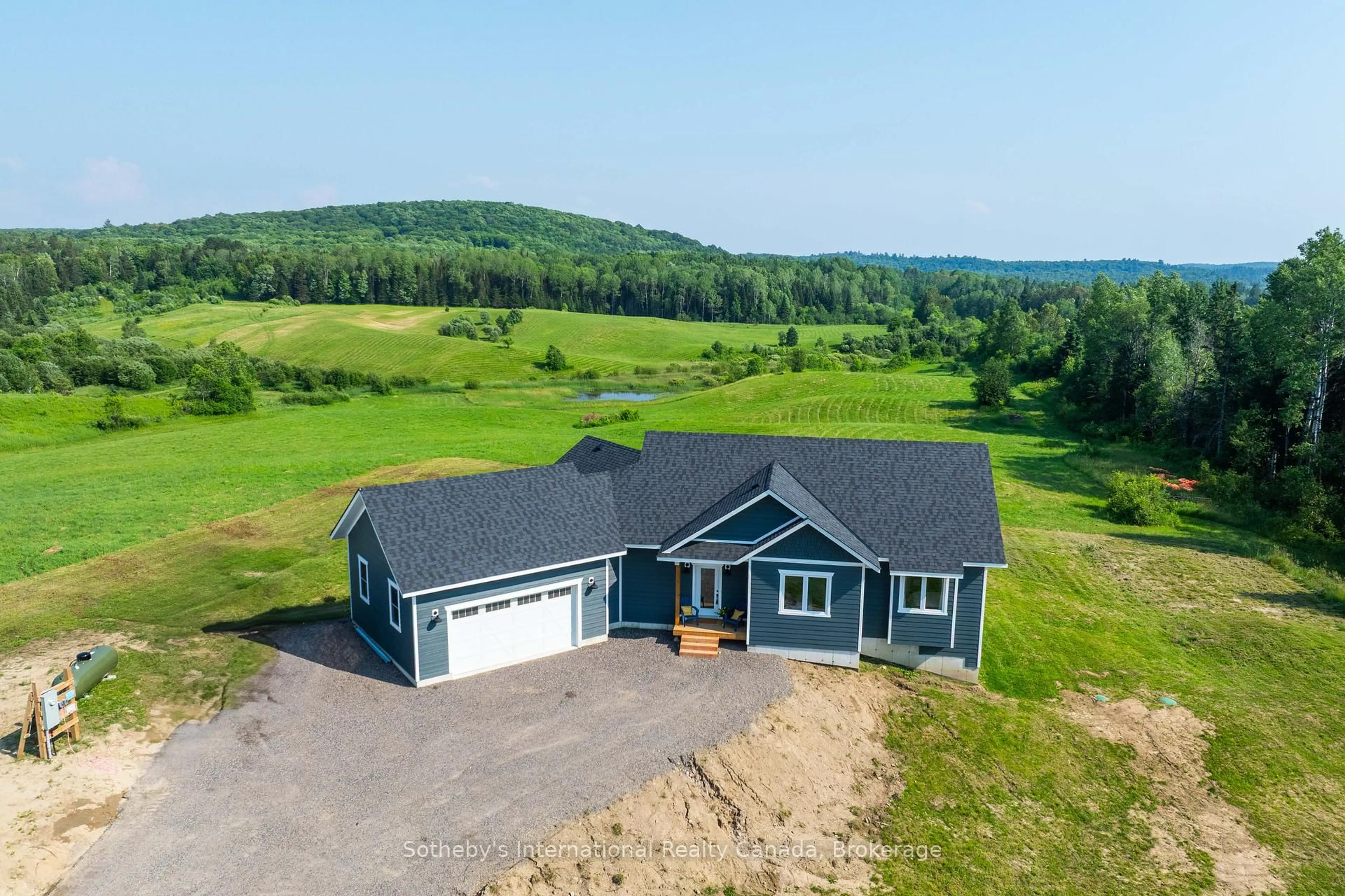 A pic from outside/outdoor area/front of a property/back of a property/a pic from drone, unknown for 141 Three Mile Lake Rd, Armour Ontario P0A 1L0
