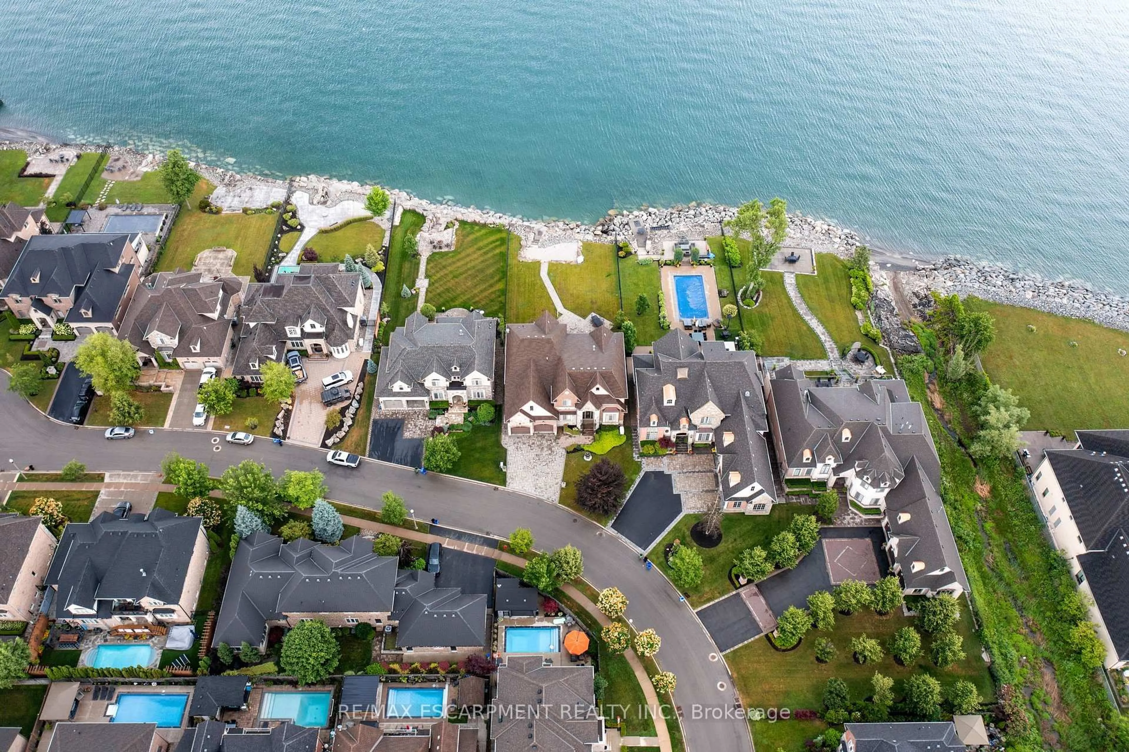 A pic from outside/outdoor area/front of a property/back of a property/a pic from drone, water/lake/river/ocean view for 56 AQUAMARINE Dr, Hamilton Ontario L8E 0E8
