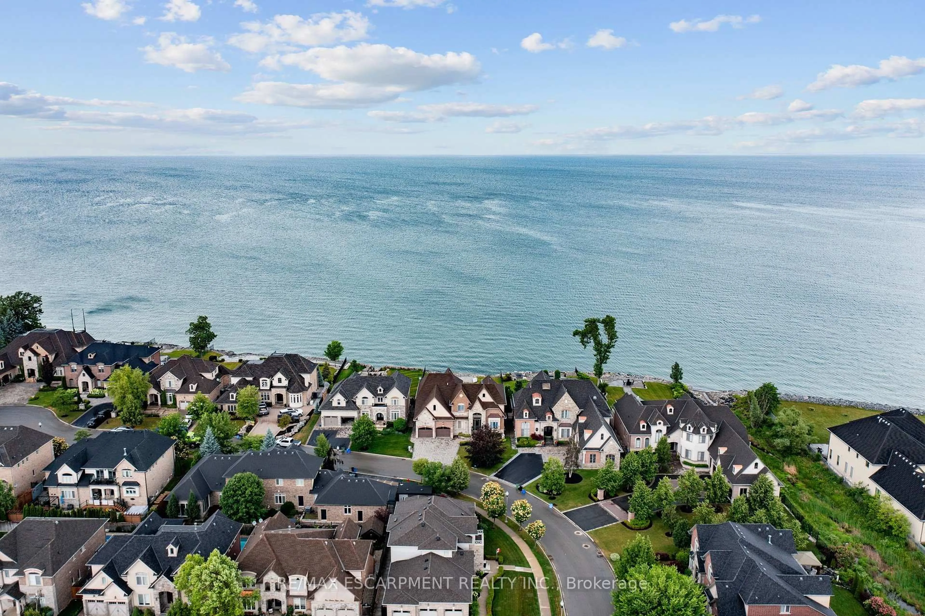 A pic from outside/outdoor area/front of a property/back of a property/a pic from drone, water/lake/river/ocean view for 56 AQUAMARINE Dr, Hamilton Ontario L8E 0E8