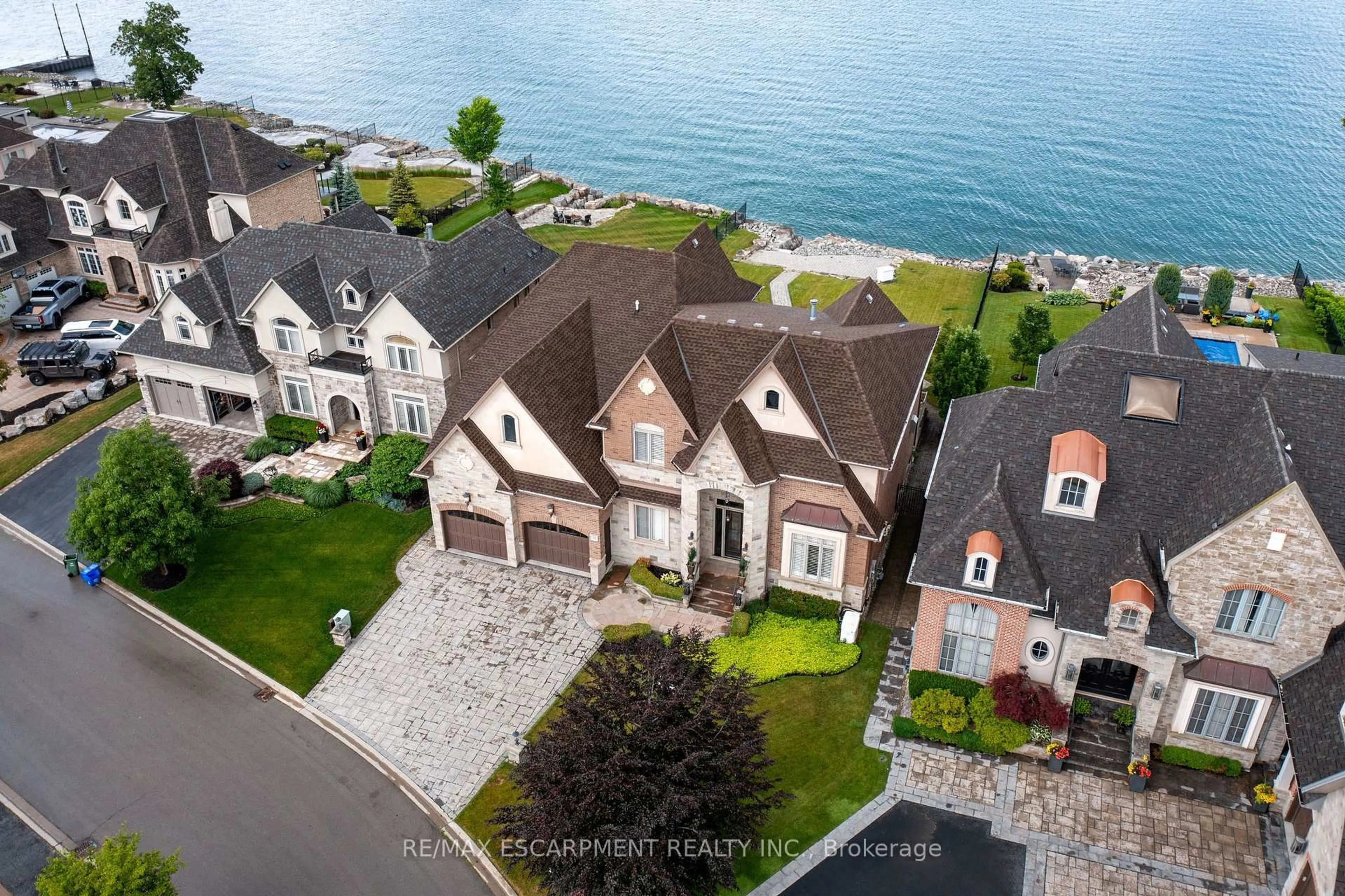 A pic from outside/outdoor area/front of a property/back of a property/a pic from drone, water/lake/river/ocean view for 56 AQUAMARINE Dr, Hamilton Ontario L8E 0E8