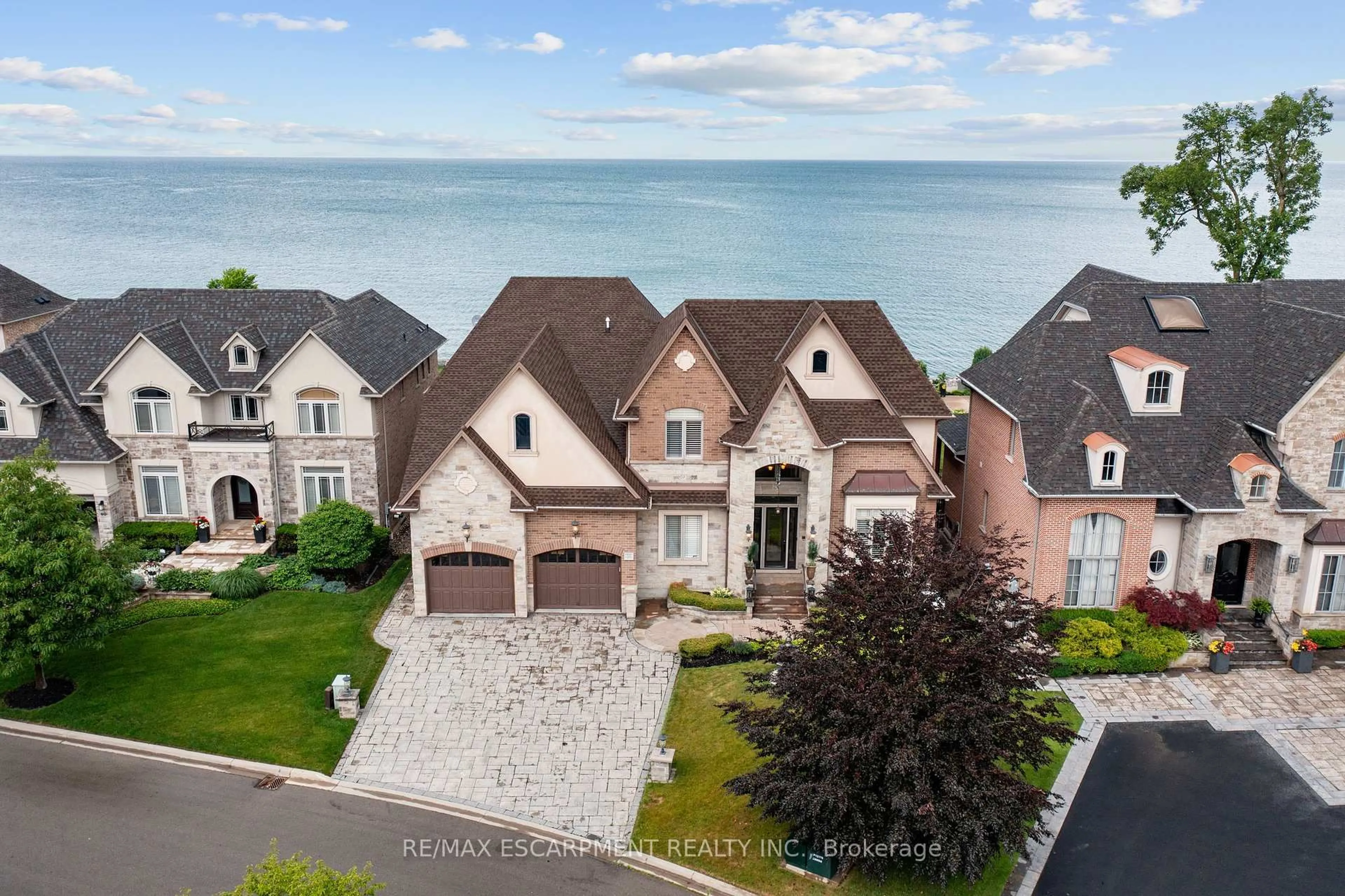 A pic from outside/outdoor area/front of a property/back of a property/a pic from drone, water/lake/river/ocean view for 56 AQUAMARINE Dr, Hamilton Ontario L8E 0E8