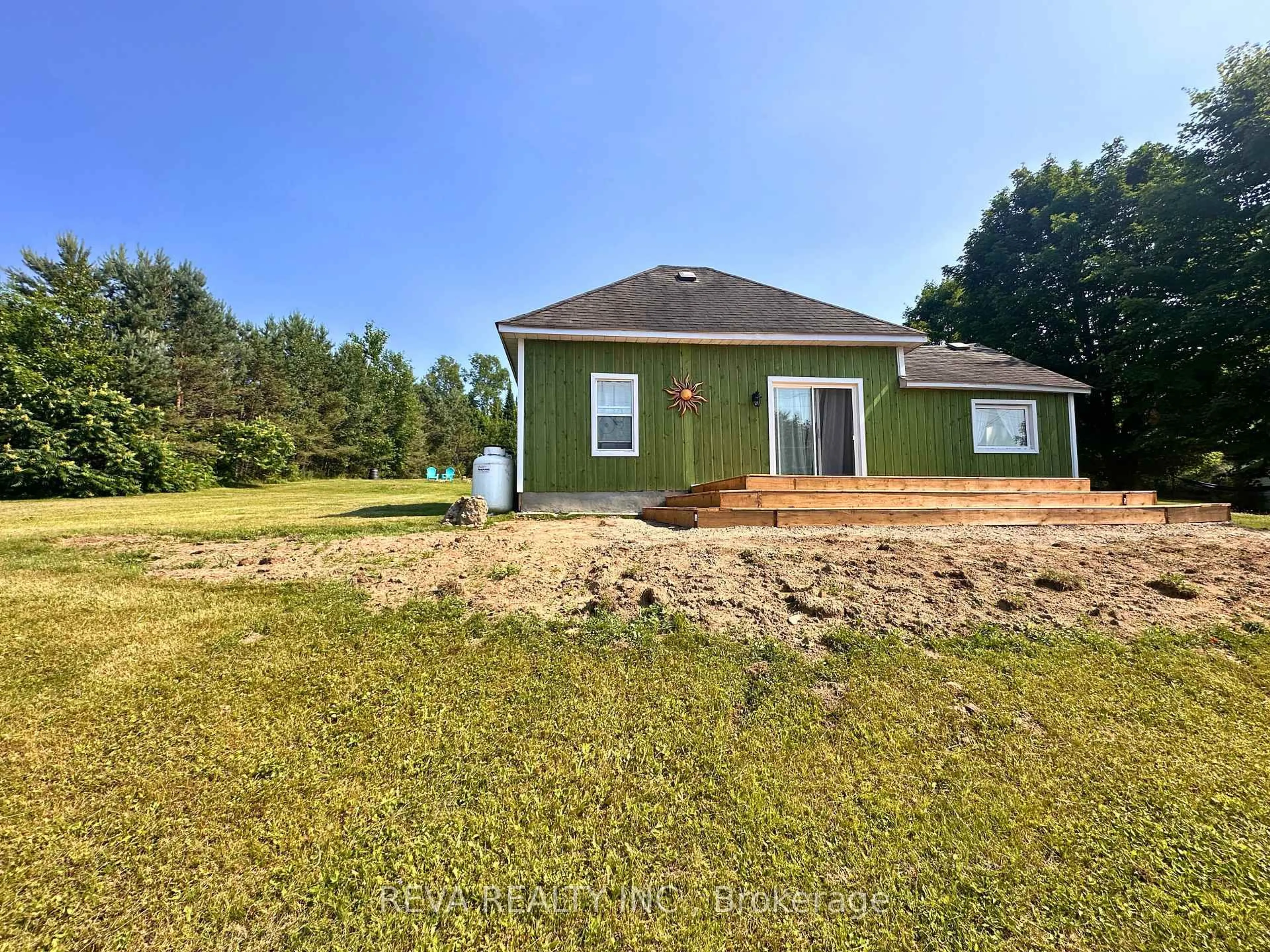 A pic from outside/outdoor area/front of a property/back of a property/a pic from drone, water/lake/river/ocean view for 135 Village Rd, Bancroft Ontario K0L 1C0