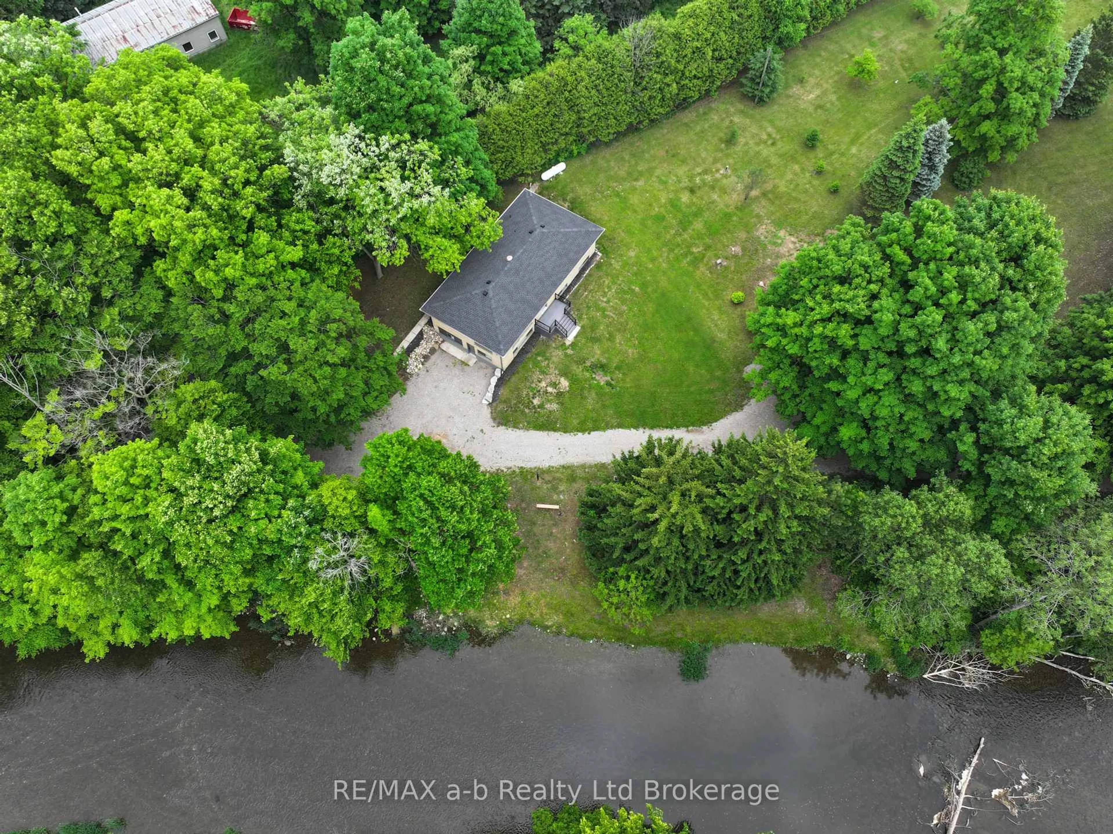 A pic from outside/outdoor area/front of a property/back of a property/a pic from drone, water/lake/river/ocean view for 743129 Road 74 Rd, Zorra Ontario N0M 2M0
