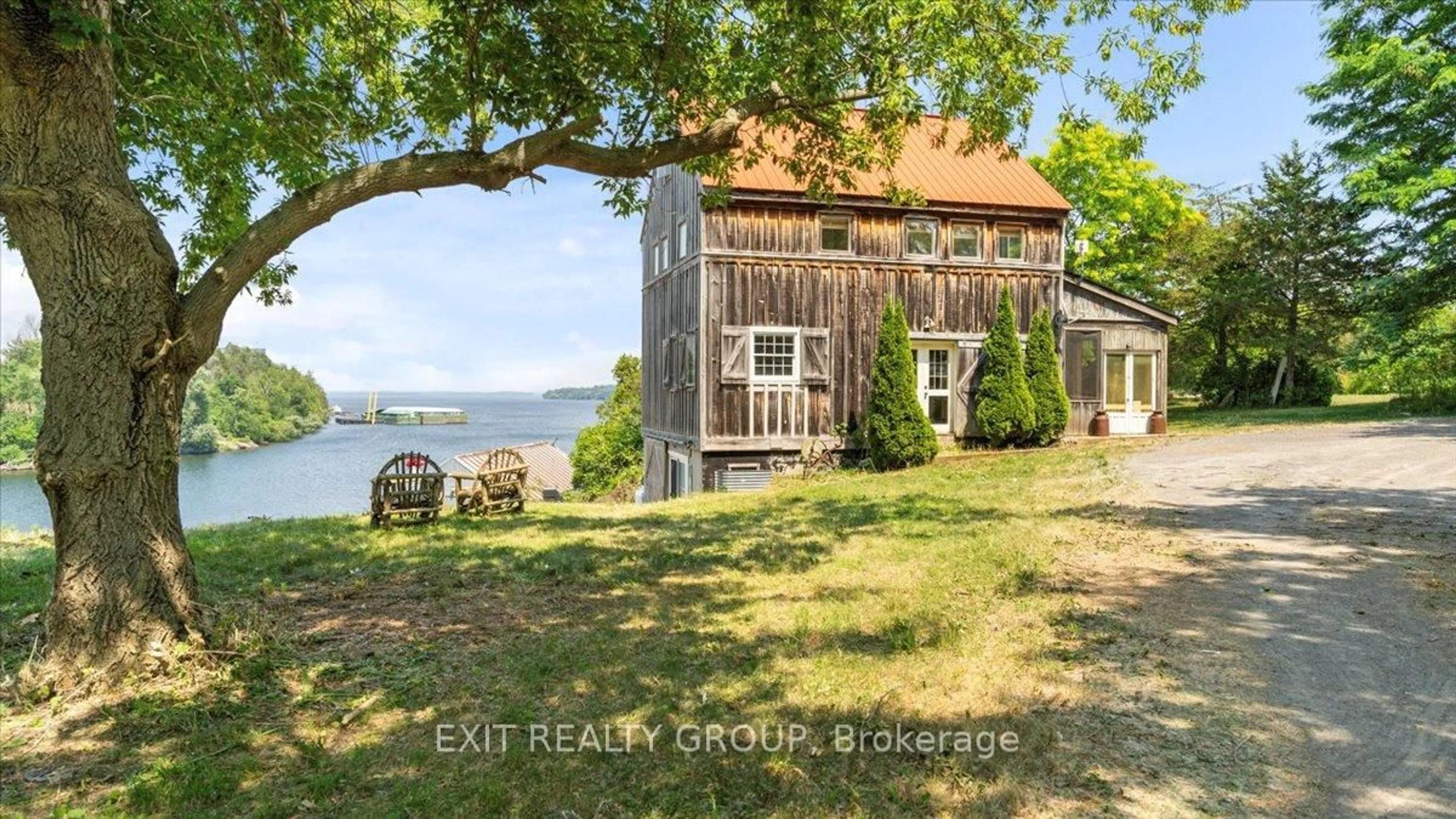 A pic from outside/outdoor area/front of a property/back of a property/a pic from drone, water/lake/river/ocean view for 782 County Rd 49, Prince Edward County Ontario K0K 2T0