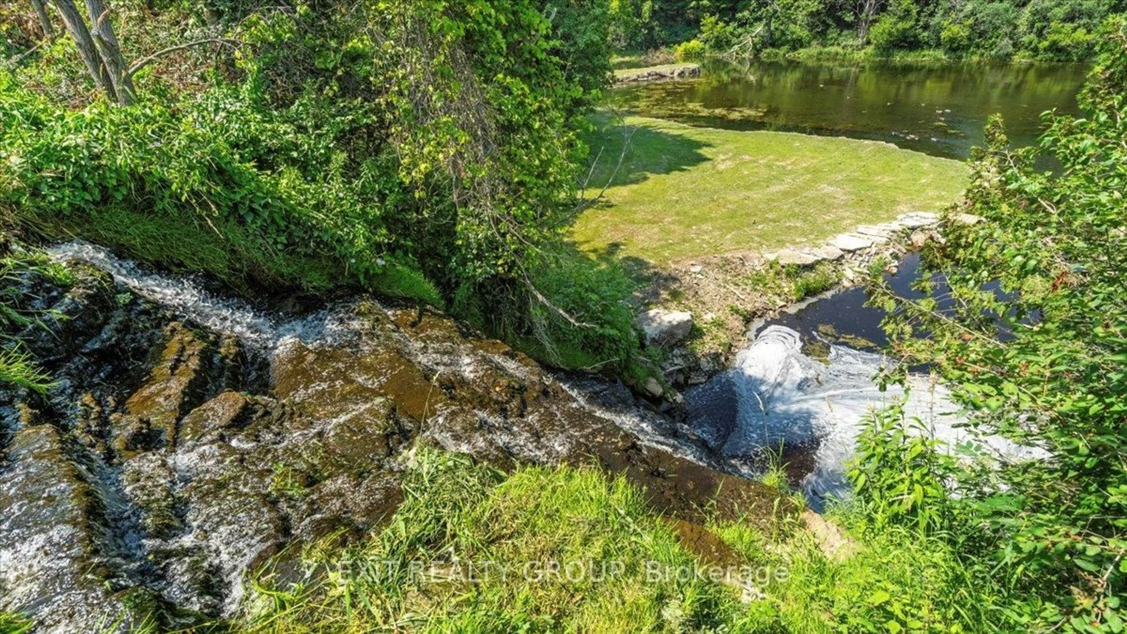 A pic from outside/outdoor area/front of a property/back of a property/a pic from drone, water/lake/river/ocean view for 782 County Rd 49, Prince Edward County Ontario K0K 2T0