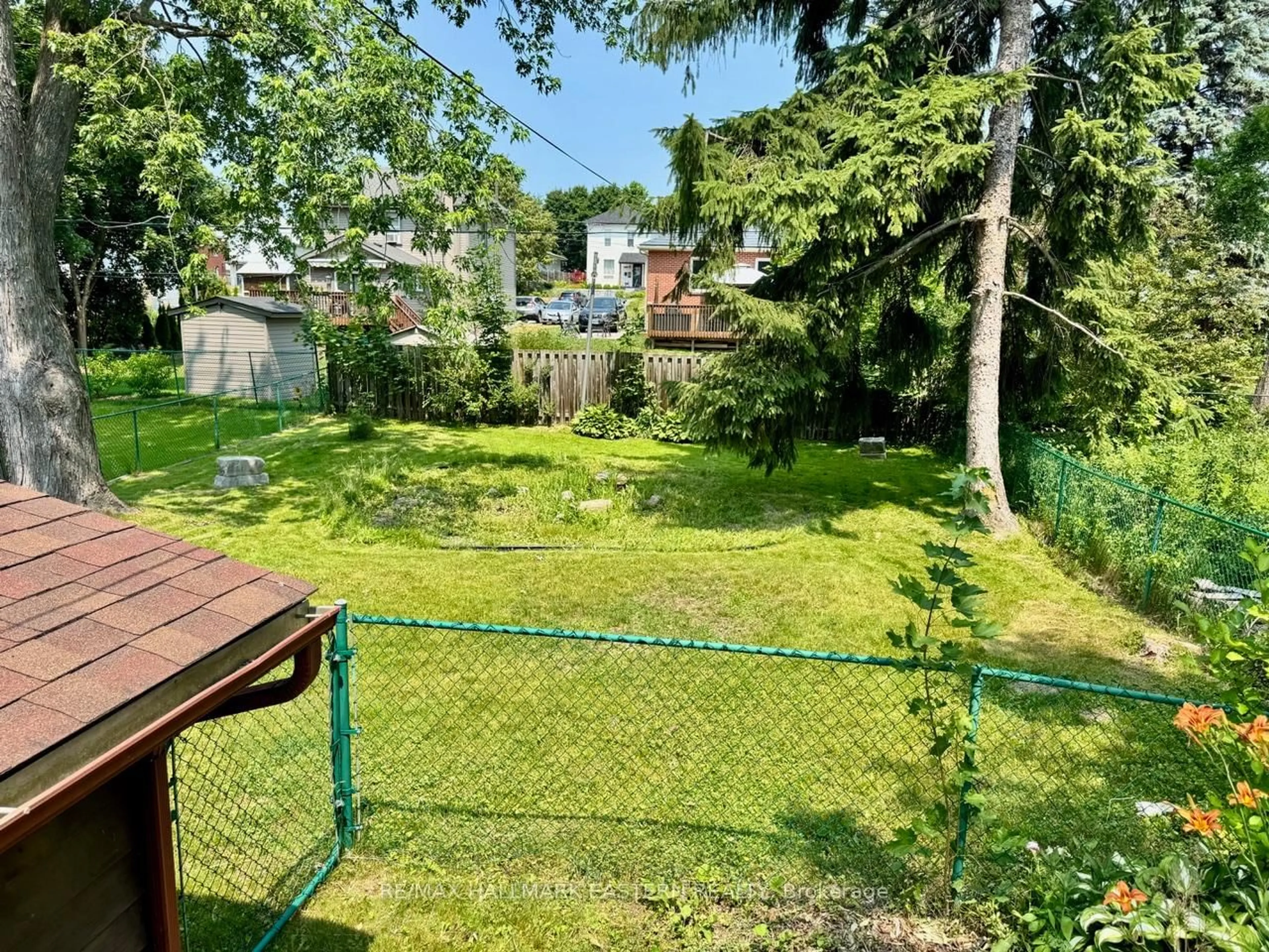 A pic from outside/outdoor area/front of a property/back of a property/a pic from drone, forest/trees view for 232 Munroe Ave, Peterborough East Ontario K9H 1H8