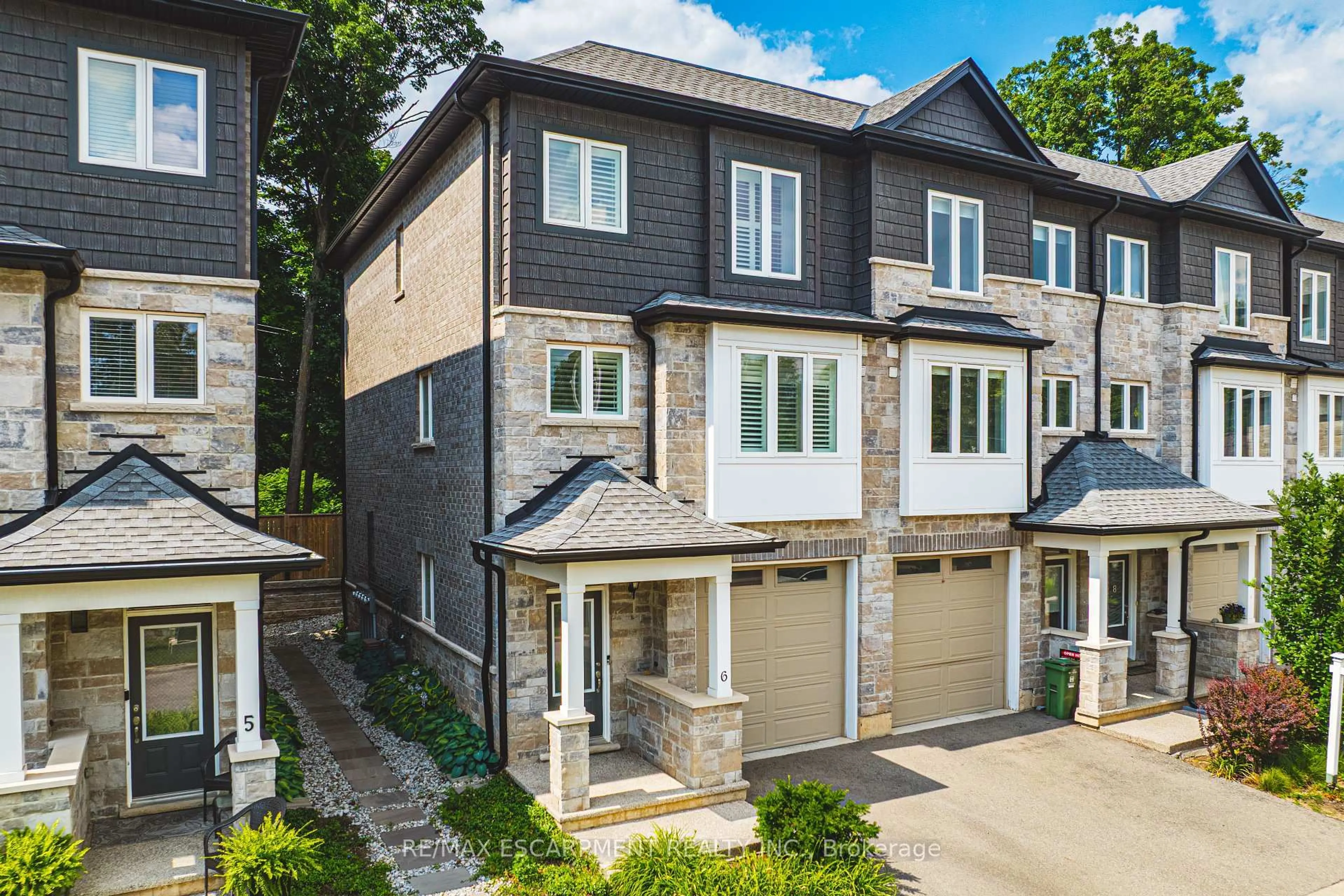 Home with brick exterior material, street for 111 Wilson St #6, Hamilton Ontario L9B 2G7