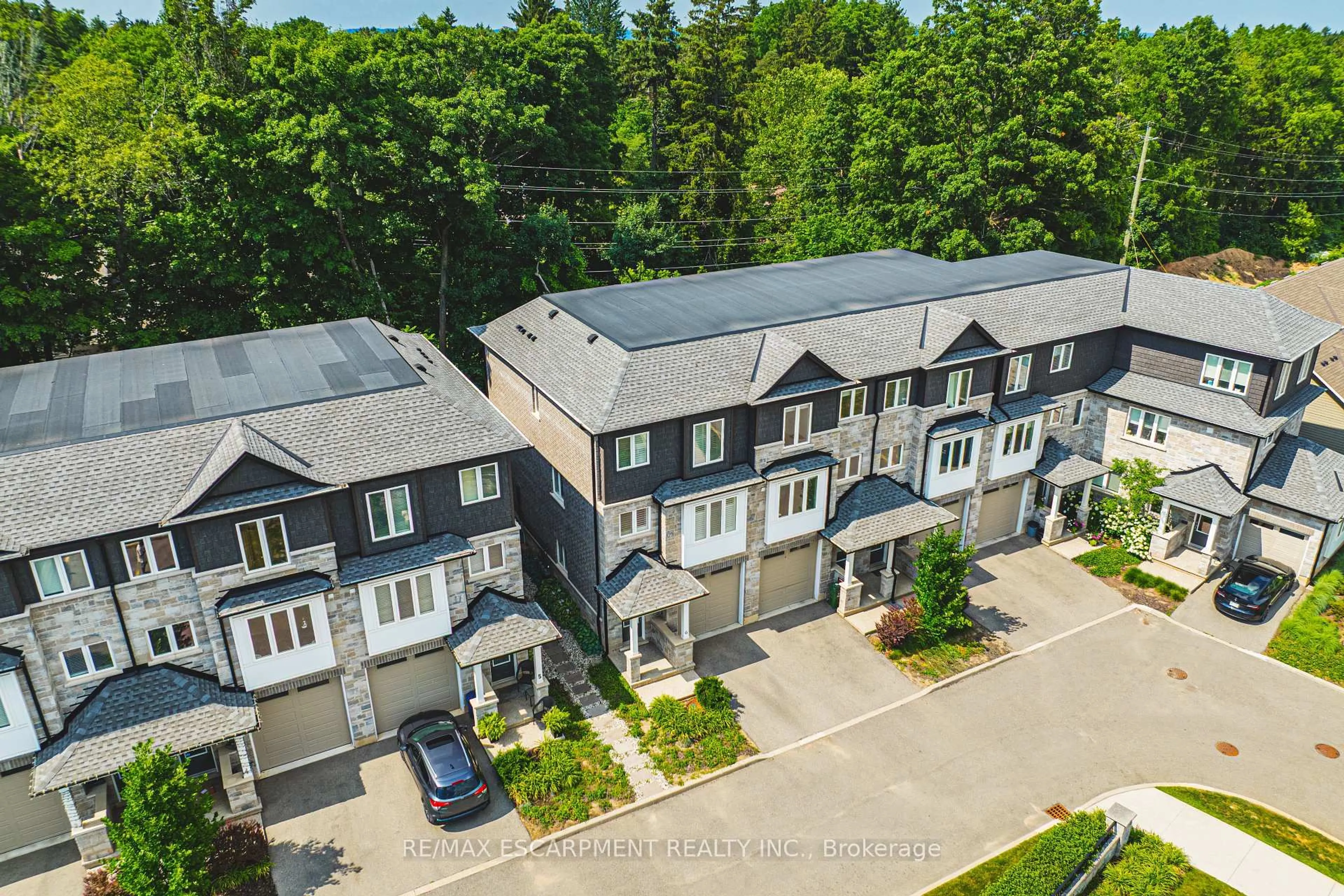 A pic from outside/outdoor area/front of a property/back of a property/a pic from drone, street for 111 Wilson St #6, Hamilton Ontario L9B 2G7