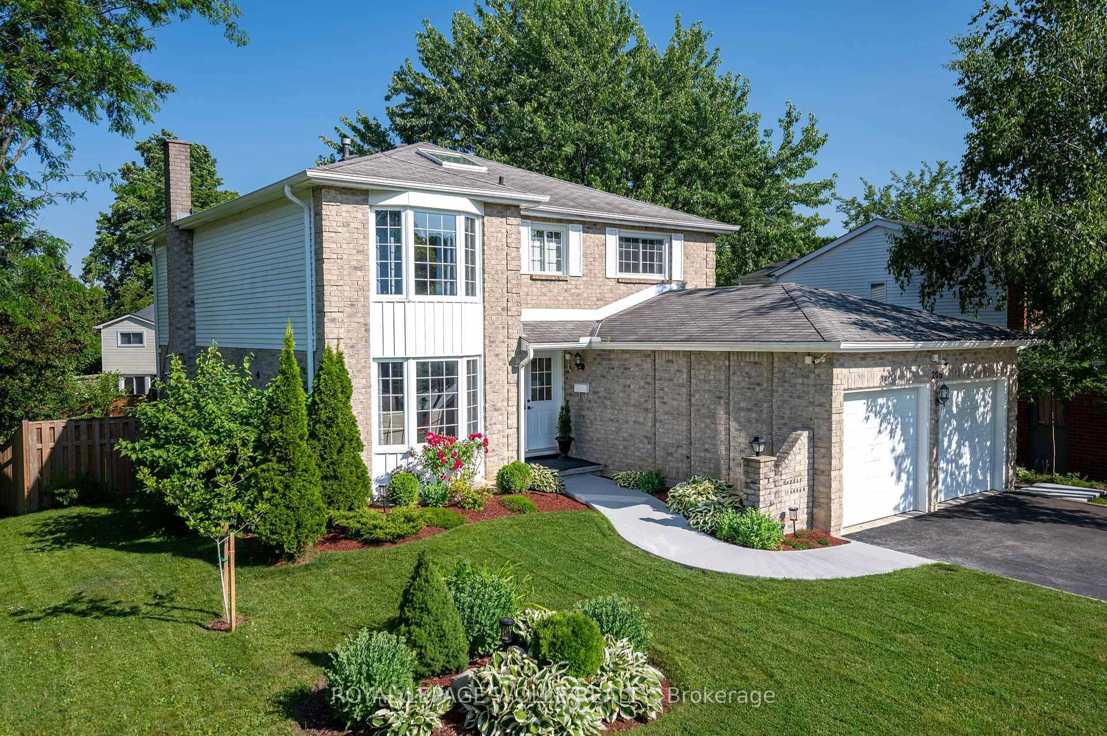 Home with brick exterior material, street for 206 Westvale Dr, Waterloo Ontario N2T 1C3