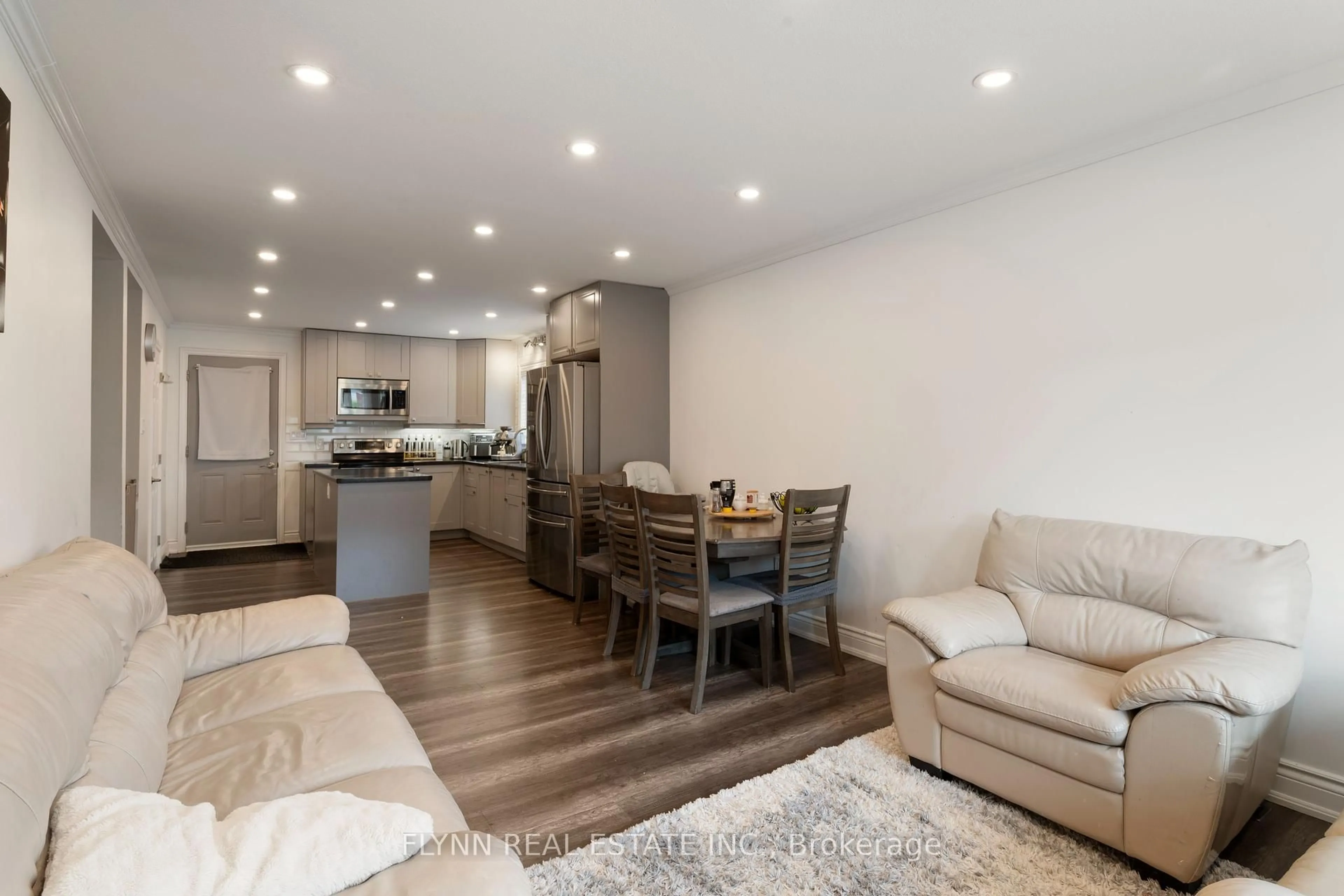 Open concept kitchen, wood/laminate floor for 116 Elmview St, Welland Ontario L3C 4K7