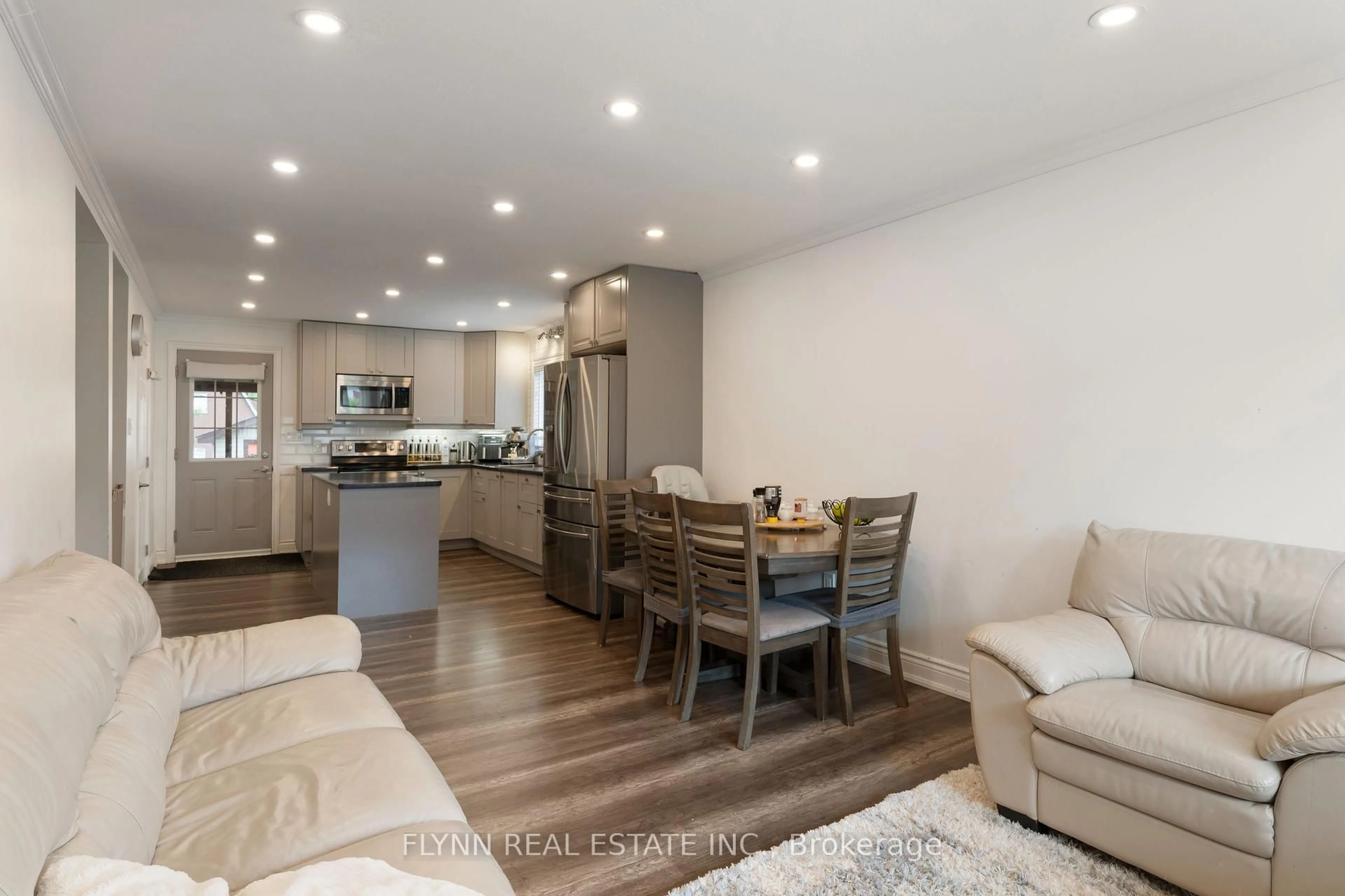 Open concept kitchen, wood/laminate floor for 116 Elmview St, Welland Ontario L3C 4K7