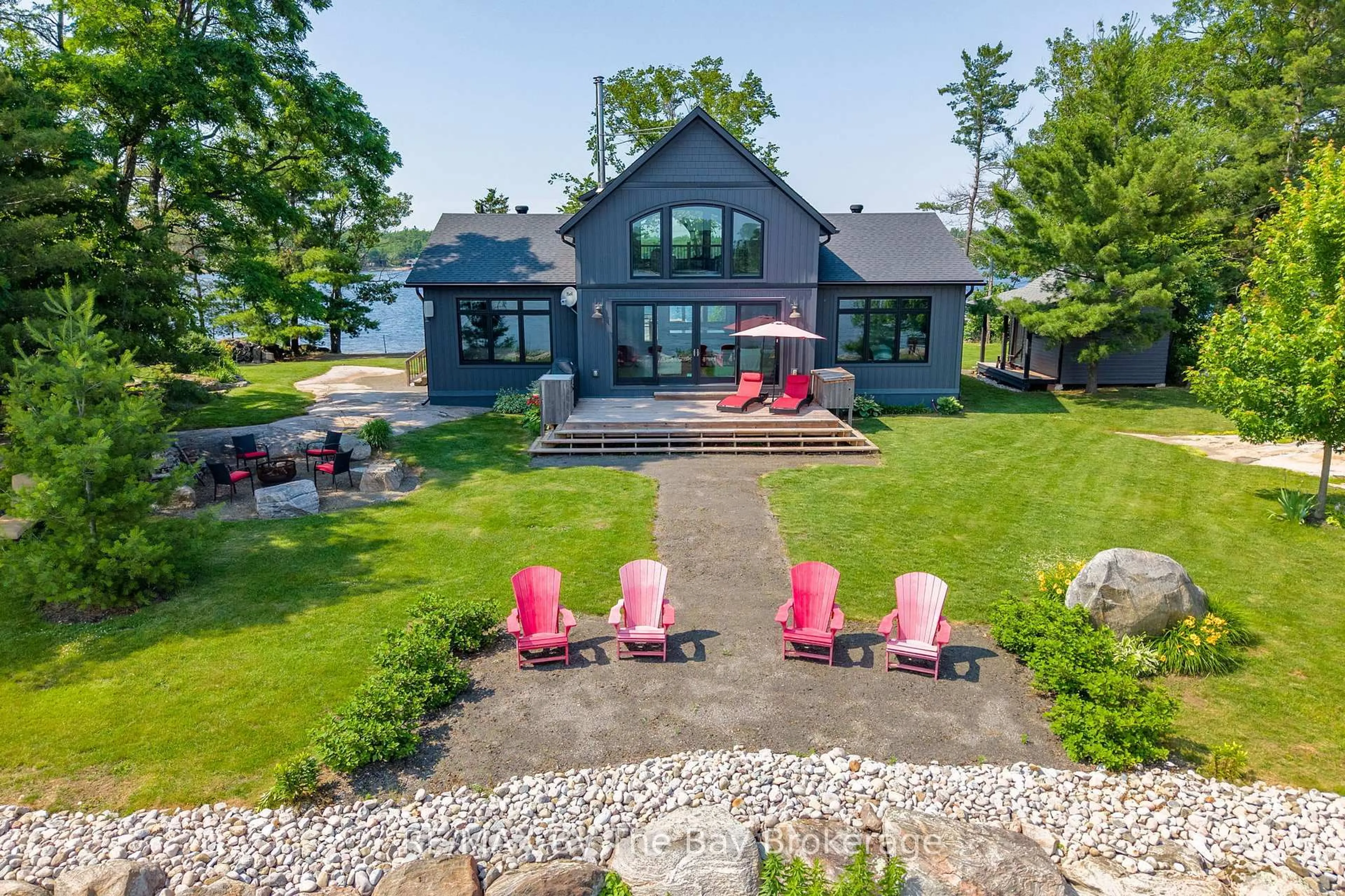 A pic from outside/outdoor area/front of a property/back of a property/a pic from drone, water/lake/river/ocean view for 4 Island 800, Georgian Bay Ontario P0E 1E0