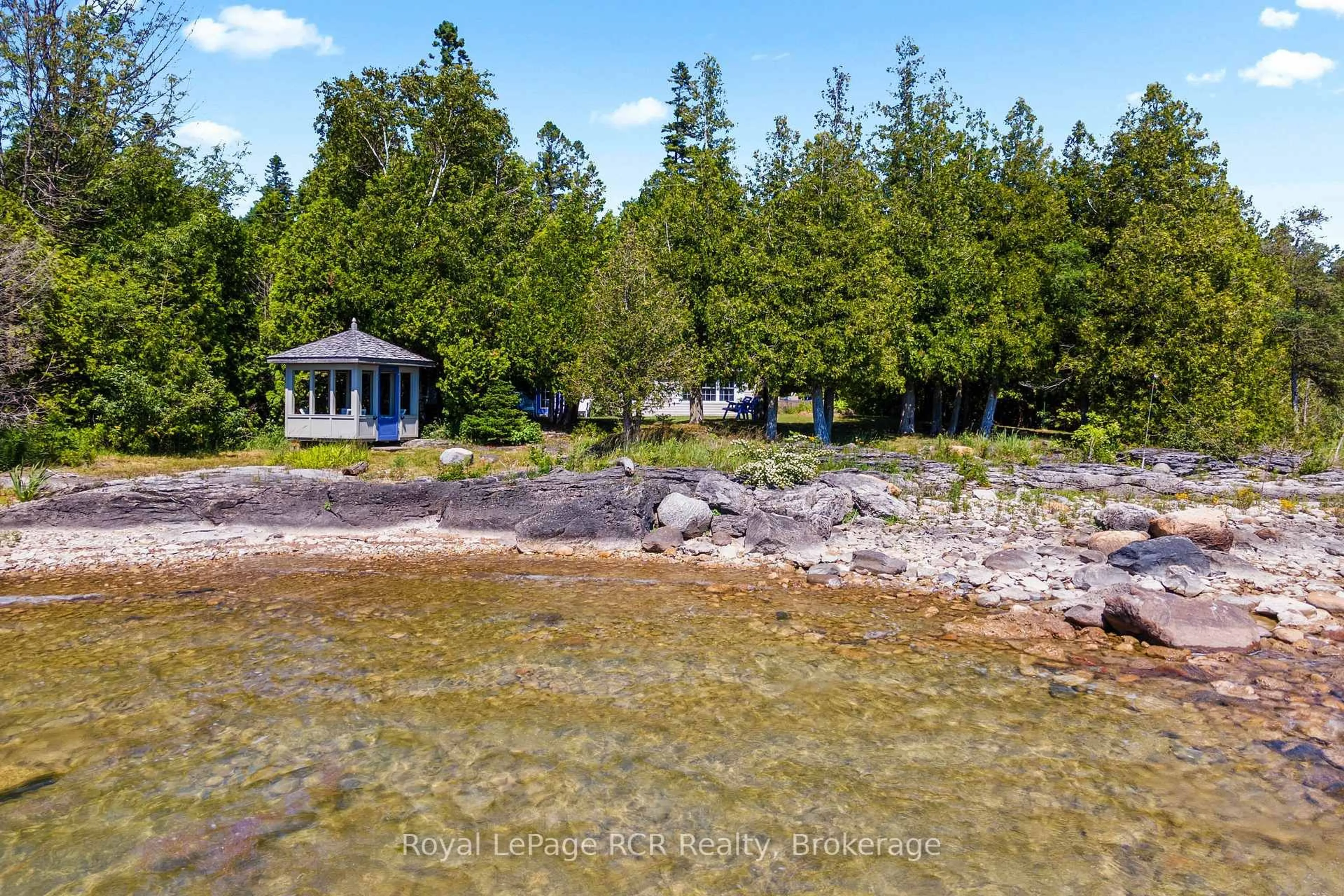 A pic from outside/outdoor area/front of a property/back of a property/a pic from drone, water/lake/river/ocean view for 115 Adelaide St, South Bruce Peninsula Ontario N0H 2T0