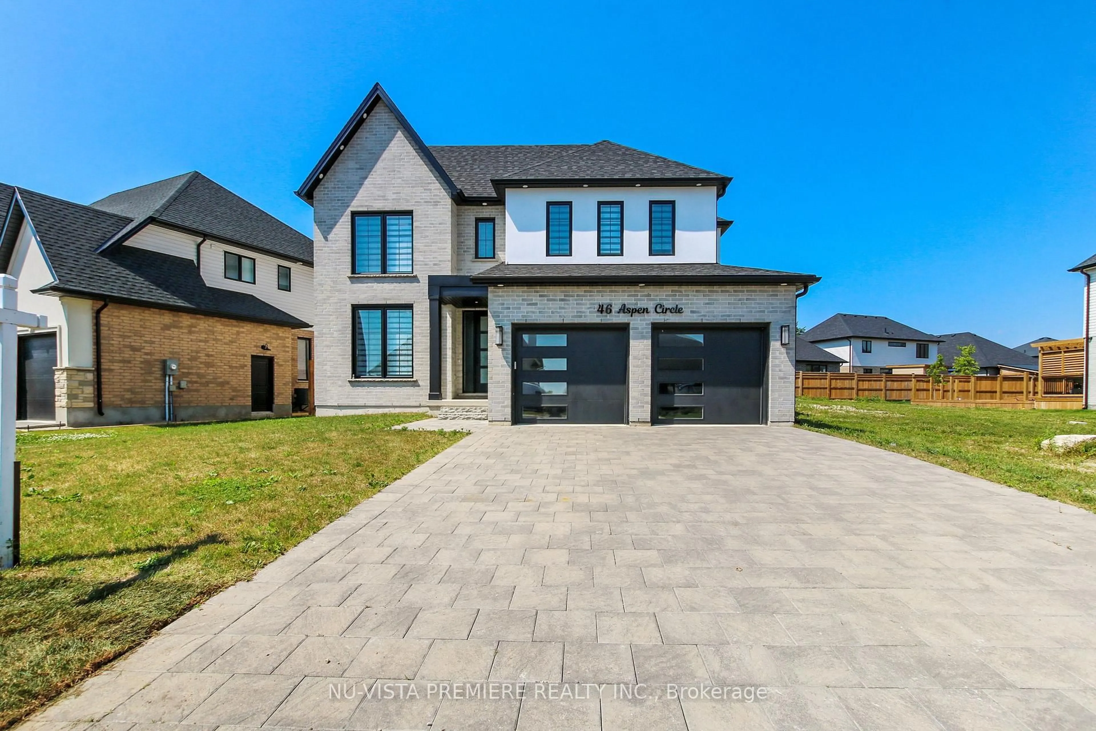 Home with brick exterior material, street for 46 Aspen Circ, Thames Centre Ontario N0M 2P0