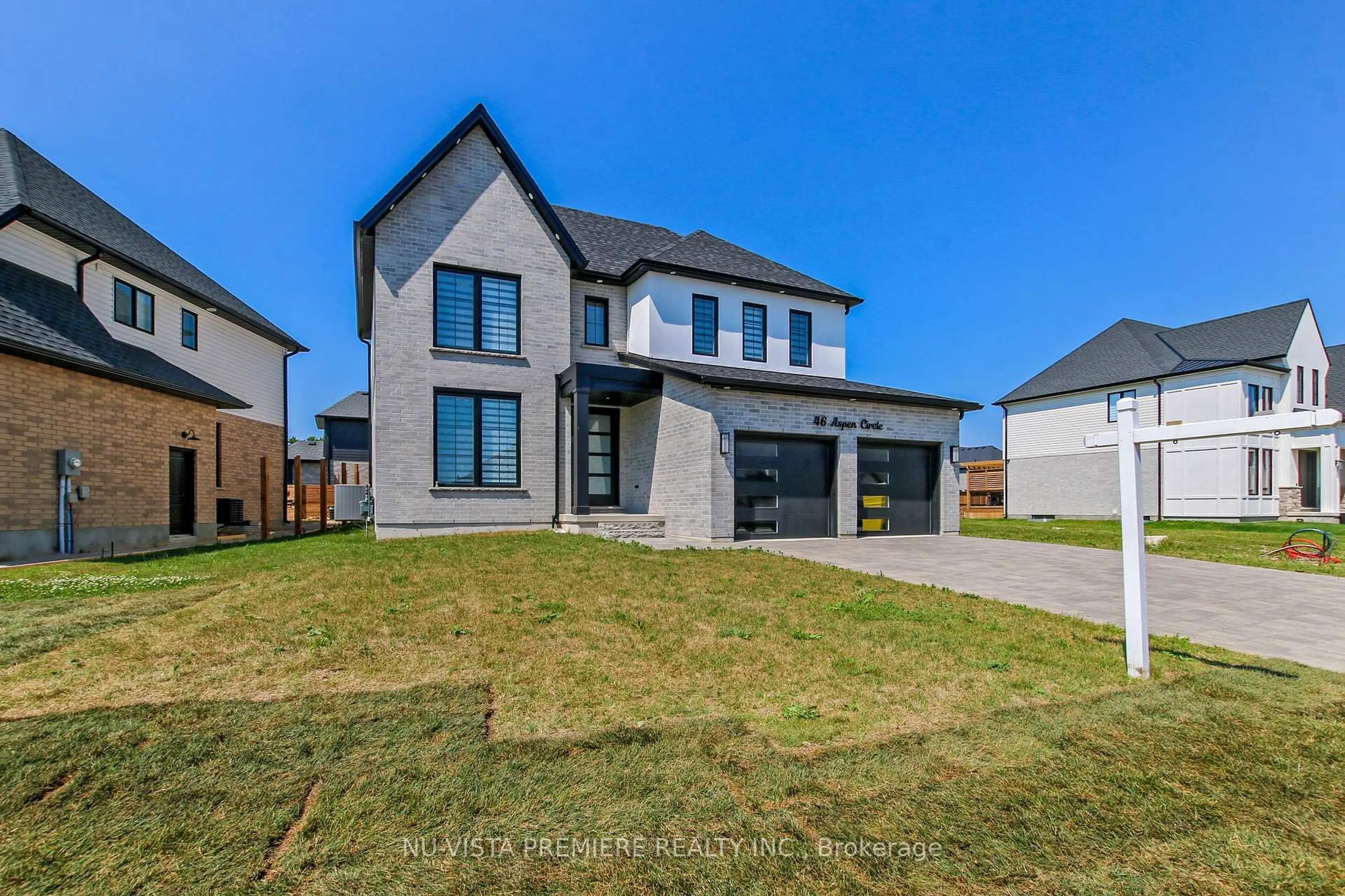 Home with brick exterior material, street for 46 Aspen Circ, Thames Centre Ontario N0M 2P0