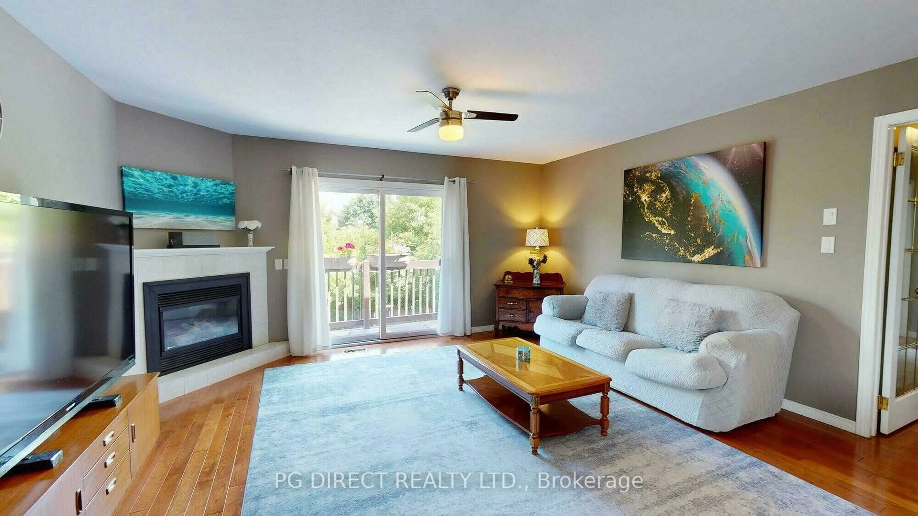 Living room with furniture, wood/laminate floor for 49 Peartree Cres, Guelph Ontario N1H 8J2