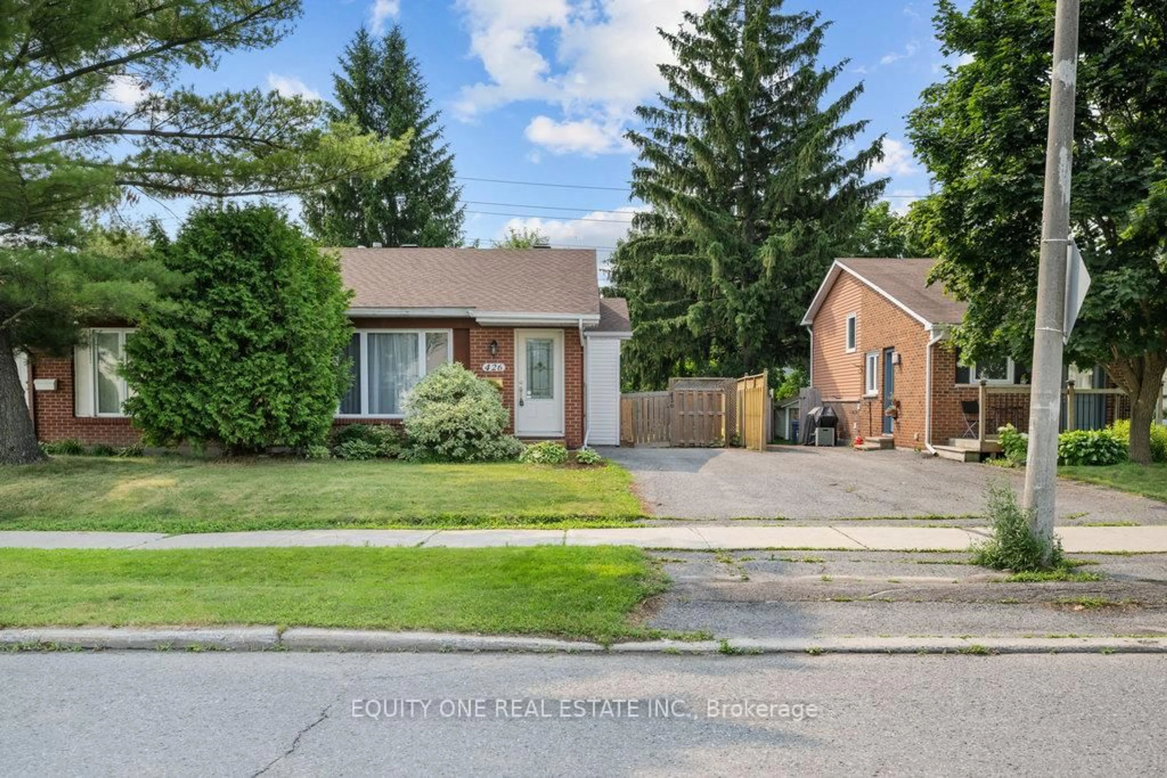 Home with brick exterior material, street for 426 Woodfield Dr, Ottawa Ontario K2G 4E5