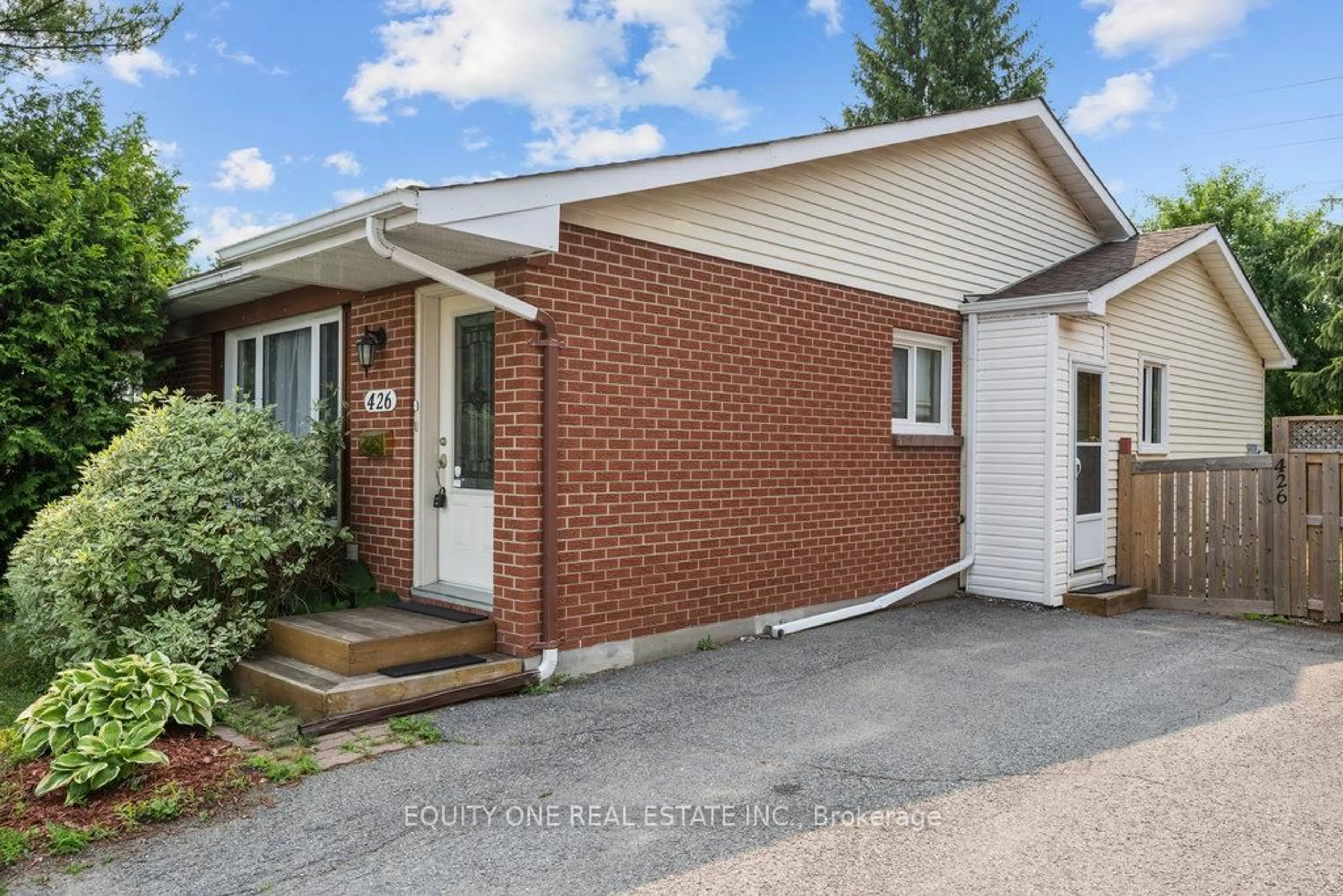 Home with brick exterior material, street for 426 Woodfield Dr, Ottawa Ontario K2G 4E5