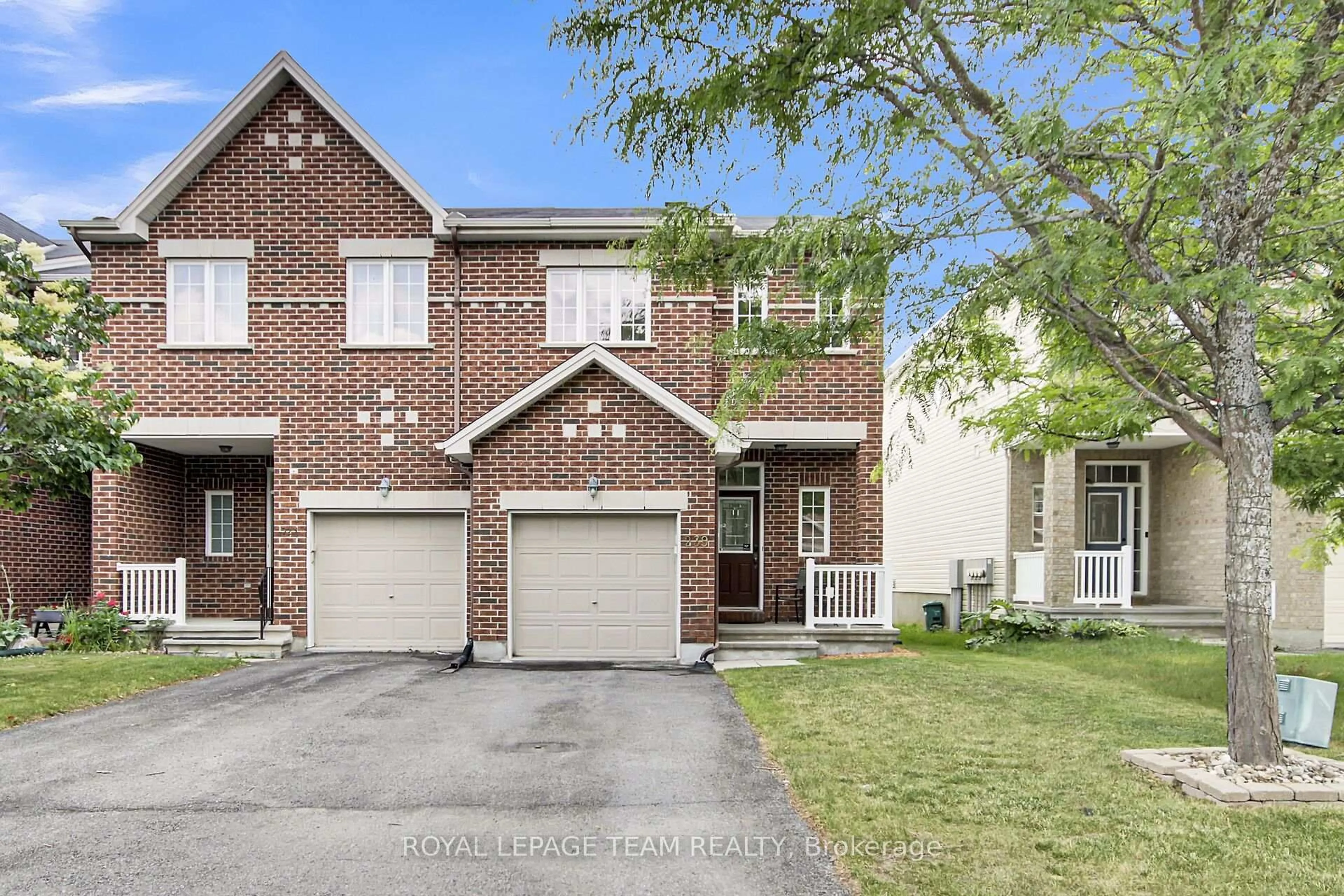 Home with brick exterior material, street for 239 Waymark Cres, Ottawa Ontario K2M 0A6