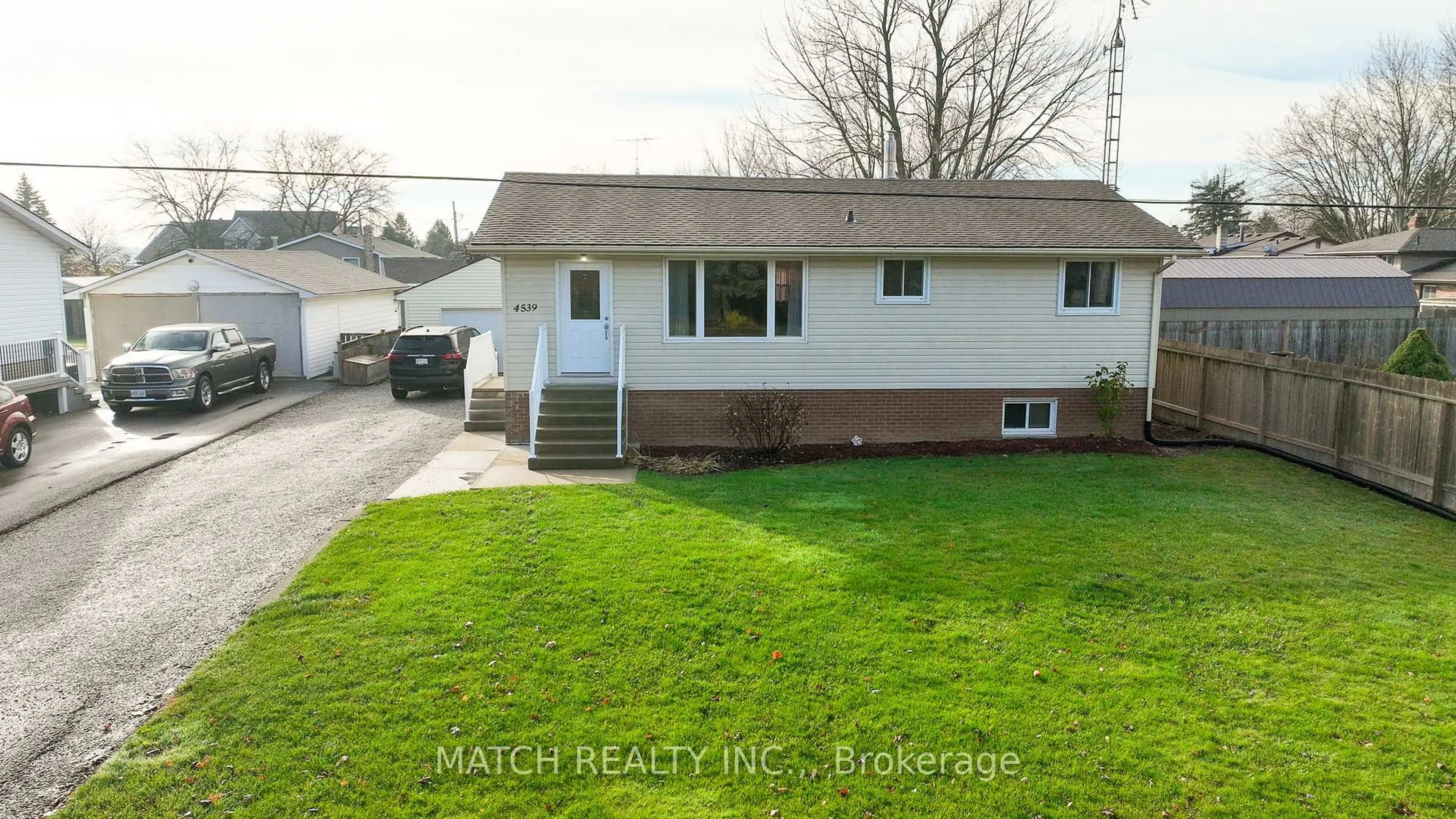 Home with vinyl exterior material, street for 4539 Shamrock St, Enniskillen Ontario N0N 1N0