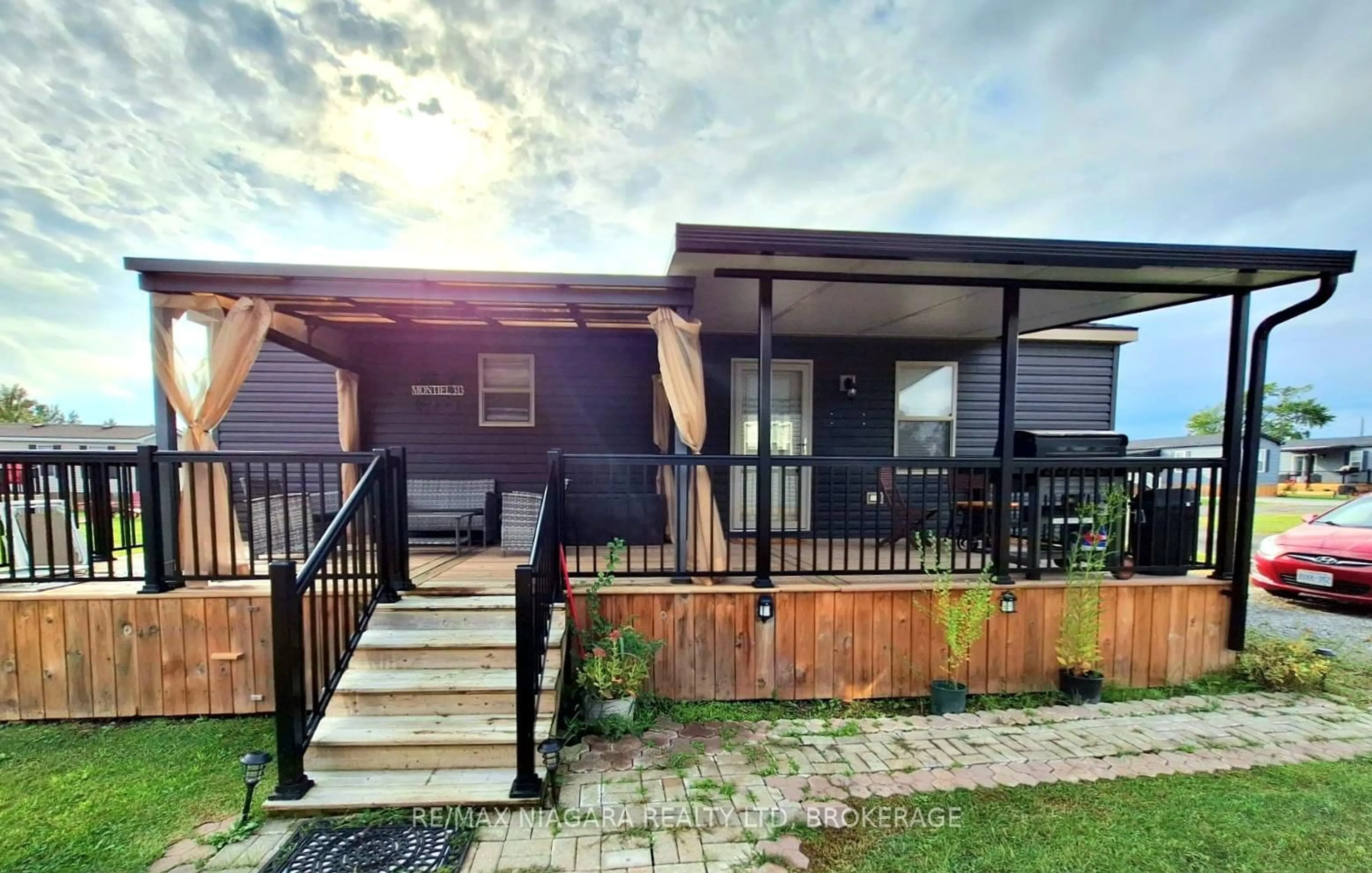 A pic from outside/outdoor area/front of a property/back of a property/a pic from drone, street for 1501 Line 8 Rd #313, Niagara-on-the-Lake Ontario L0S 1J0