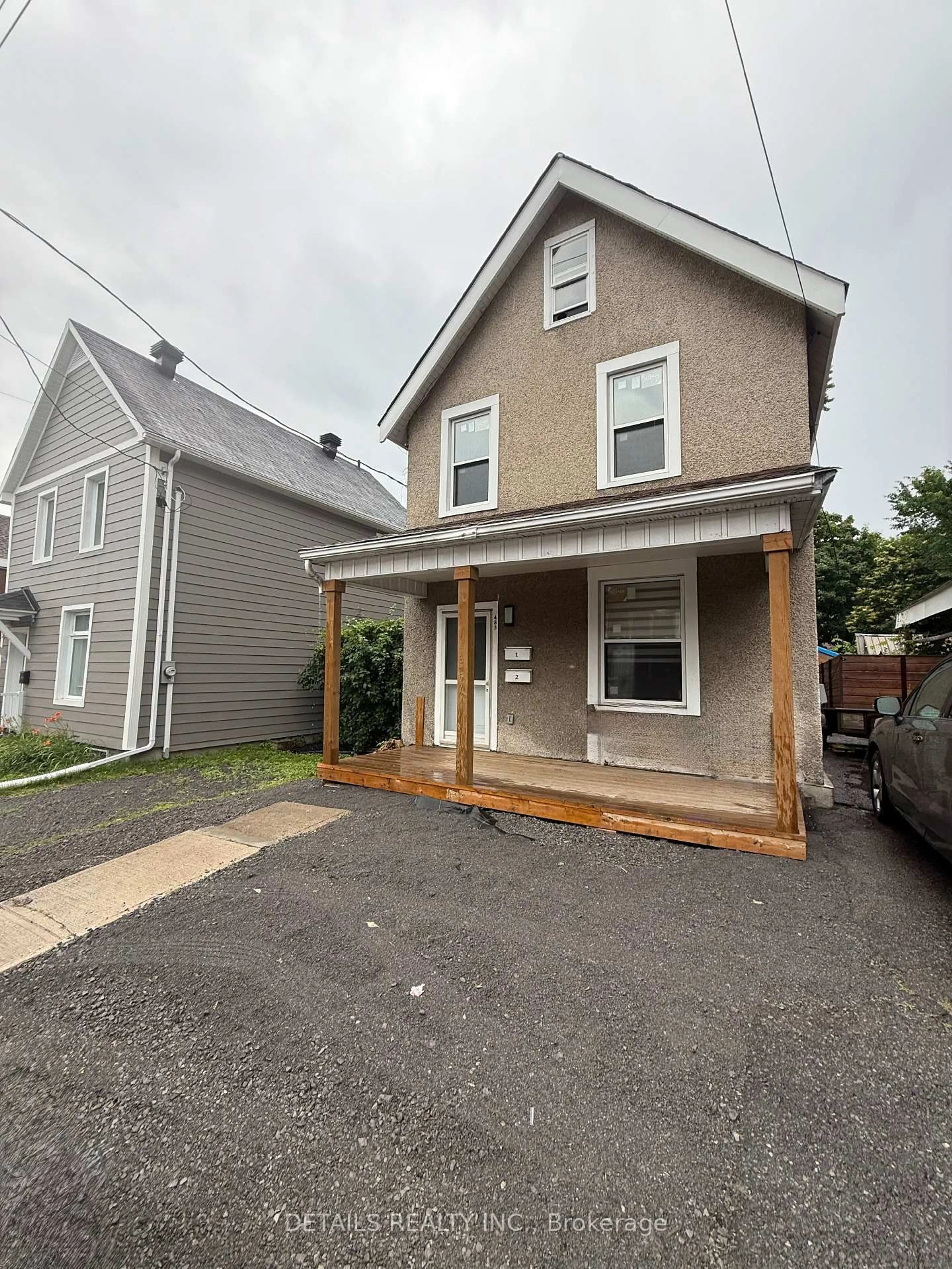 Home with vinyl exterior material, street for 483 Parkdale Ave, Ottawa Ontario K1Y 1H7