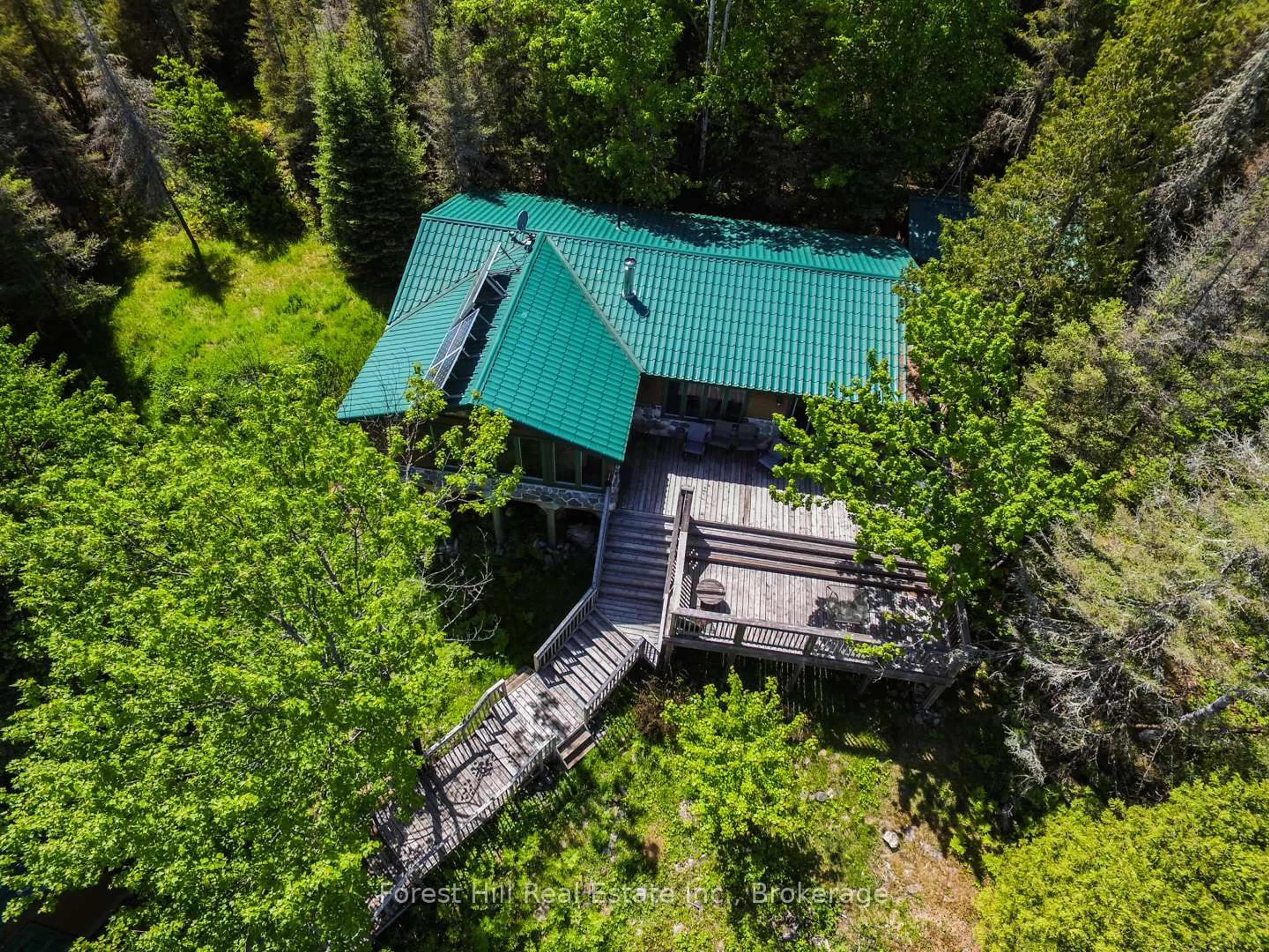 A pic from outside/outdoor area/front of a property/back of a property/a pic from drone, forest/trees view for 10365 RABBIT, Temagami Ontario P0H 2H0