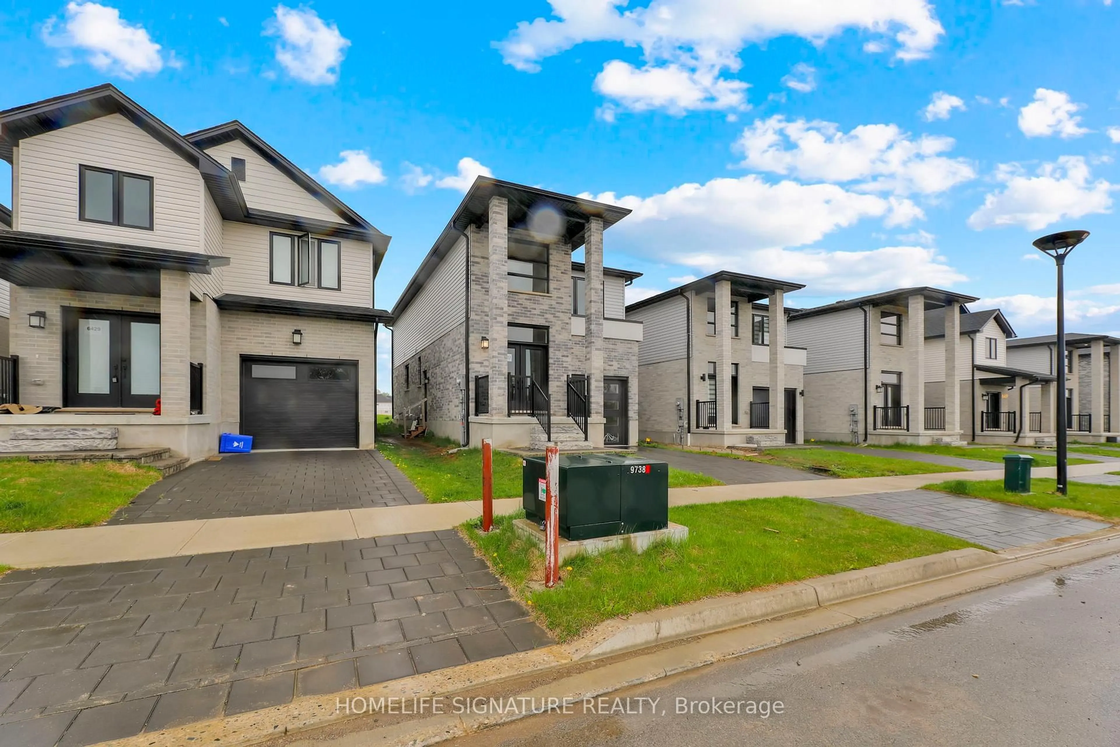A pic from outside/outdoor area/front of a property/back of a property/a pic from drone, street for 6433 Royal Magnolia Ave, London South Ontario N6P 0K2