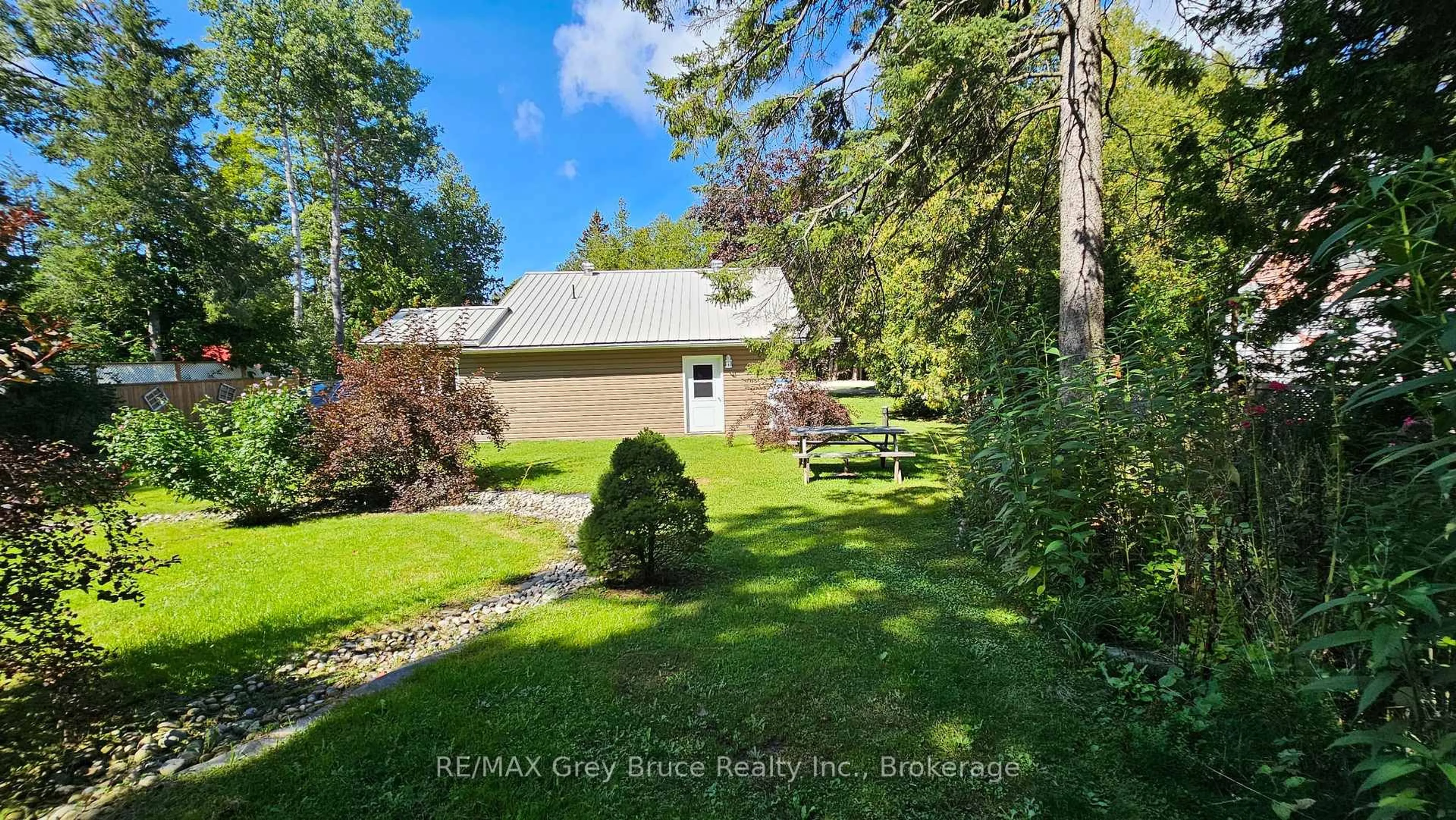 A pic from outside/outdoor area/front of a property/back of a property/a pic from drone, water/lake/river/ocean view for 549 Stokes Bay Rd, Northern Bruce Peninsula Ontario N0H 1W0