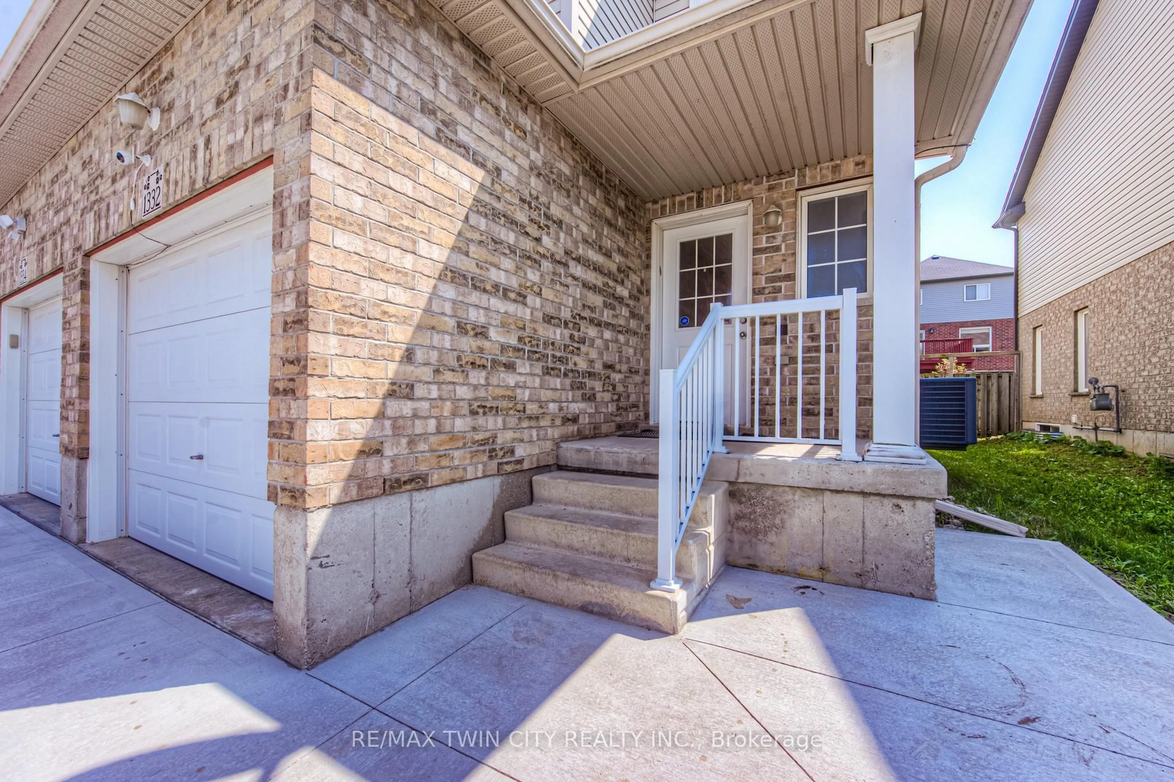 Home with brick exterior material, street for 1332 Countrystone Dr, Kitchener Ontario N2N 3R9