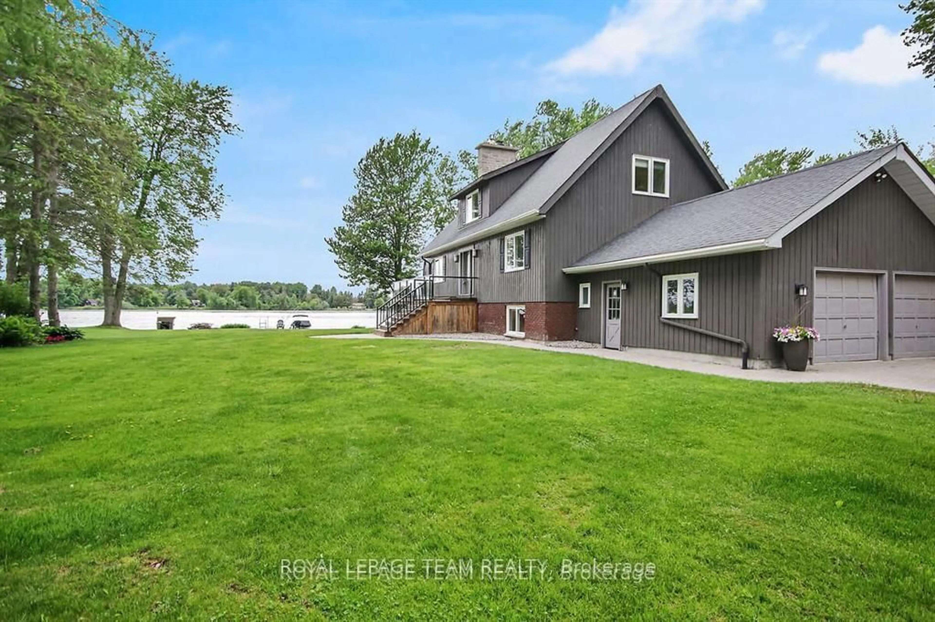 A pic from outside/outdoor area/front of a property/back of a property/a pic from drone, water/lake/river/ocean view for 3758 Mapleshore Dr, North Grenville Ontario K0G 1J0