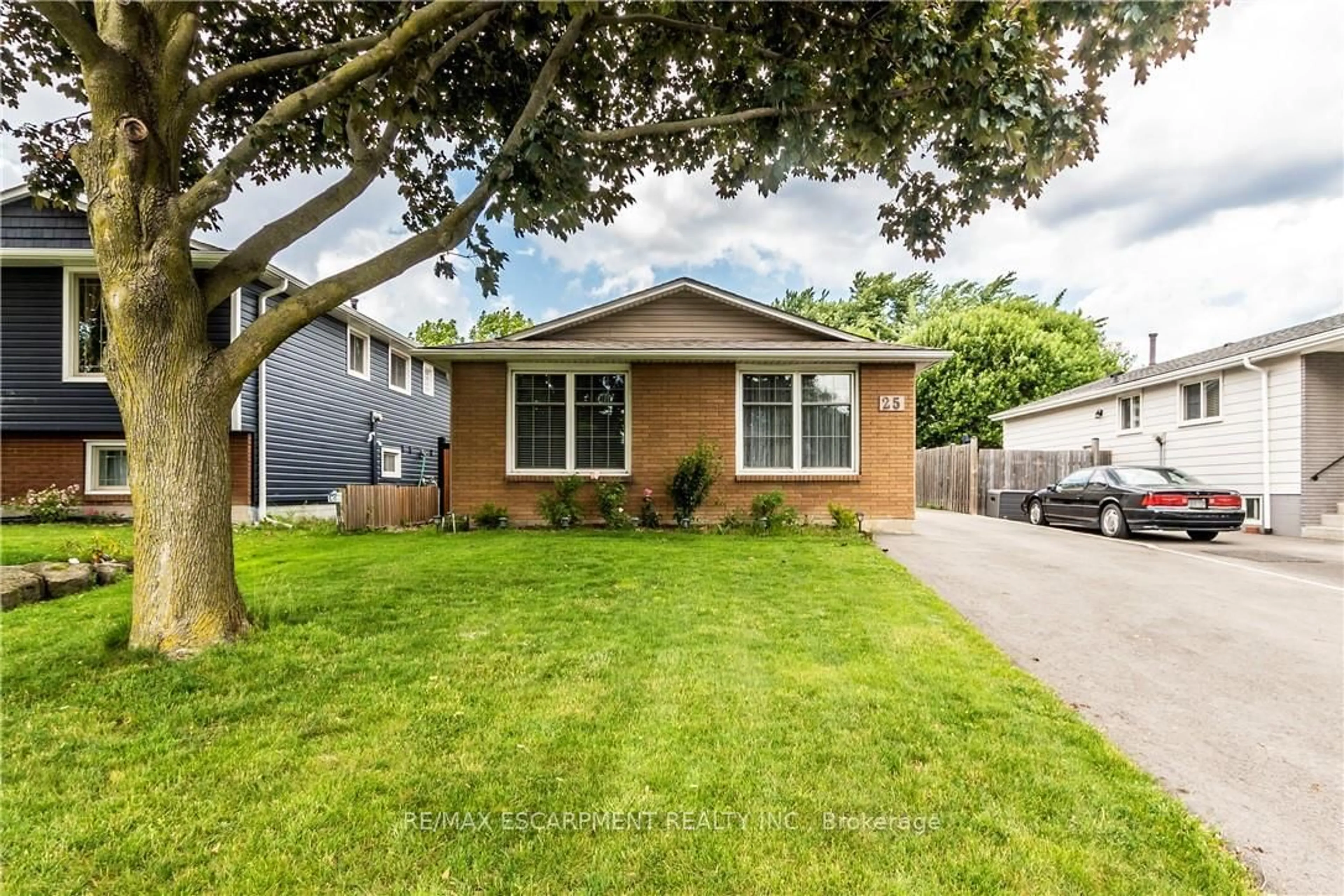 Home with brick exterior material, street for 25 Behan St, Hamilton Ontario L8T 4N5