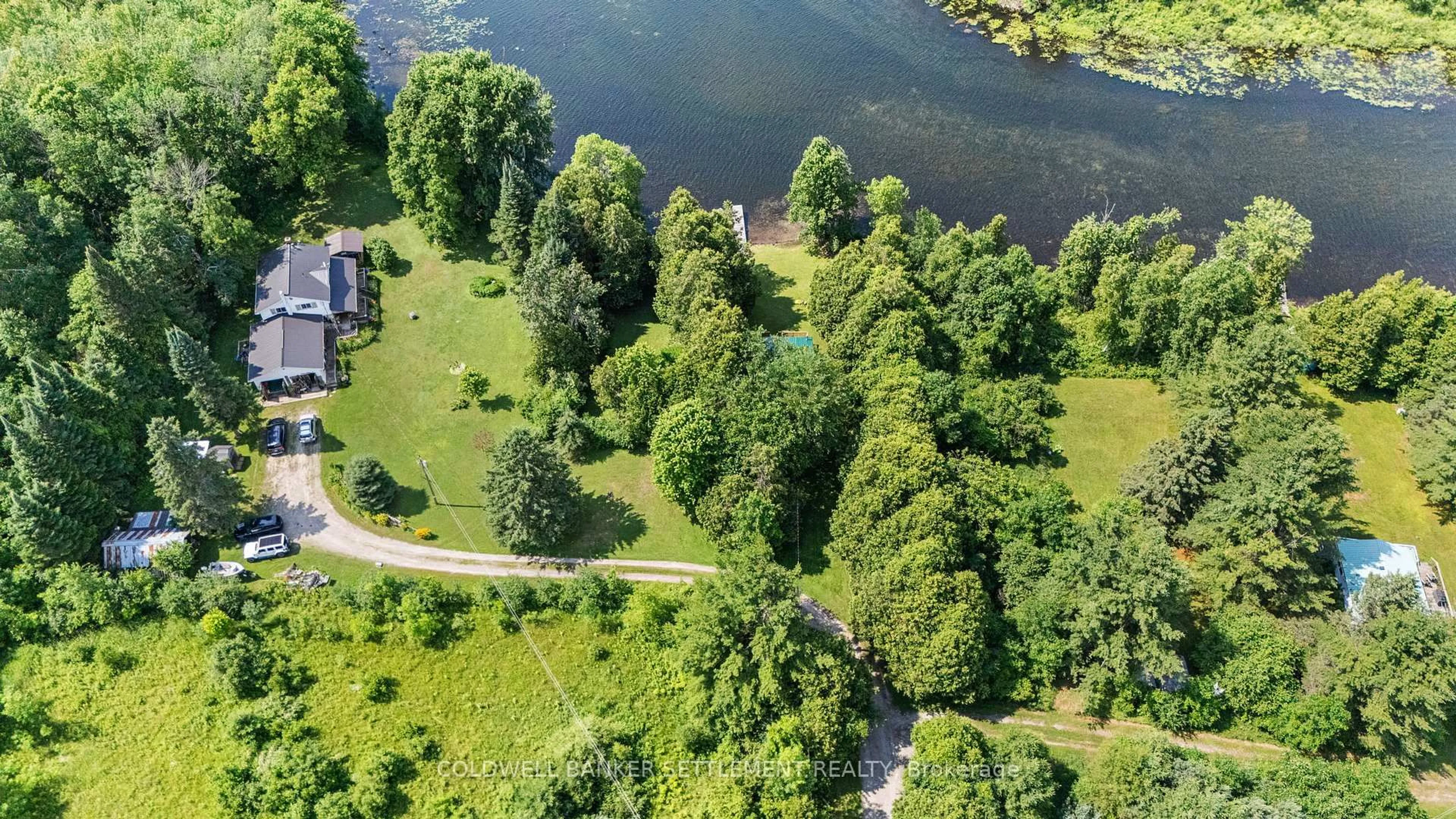 A pic from outside/outdoor area/front of a property/back of a property/a pic from drone, water/lake/river/ocean view for 236 Hall's Lane, Perth Ontario K7H 3C9