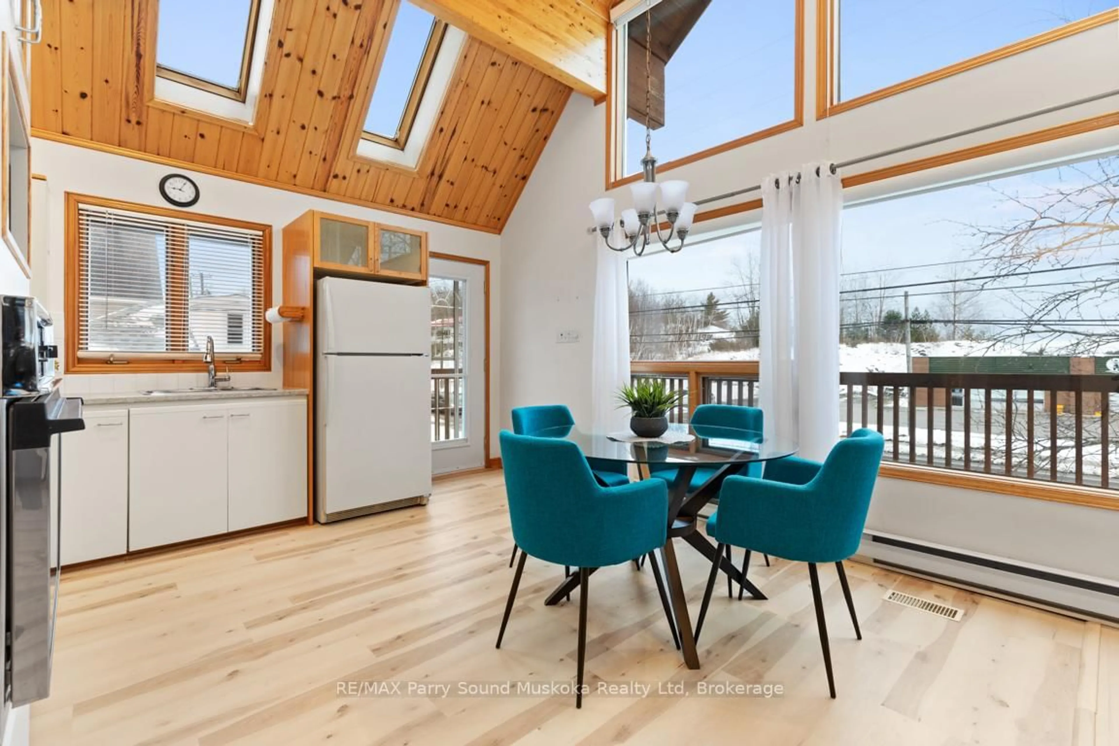 Open concept kitchen, wood/laminate floor for 14 Emily St, Parry Sound Ontario P2A 2P3