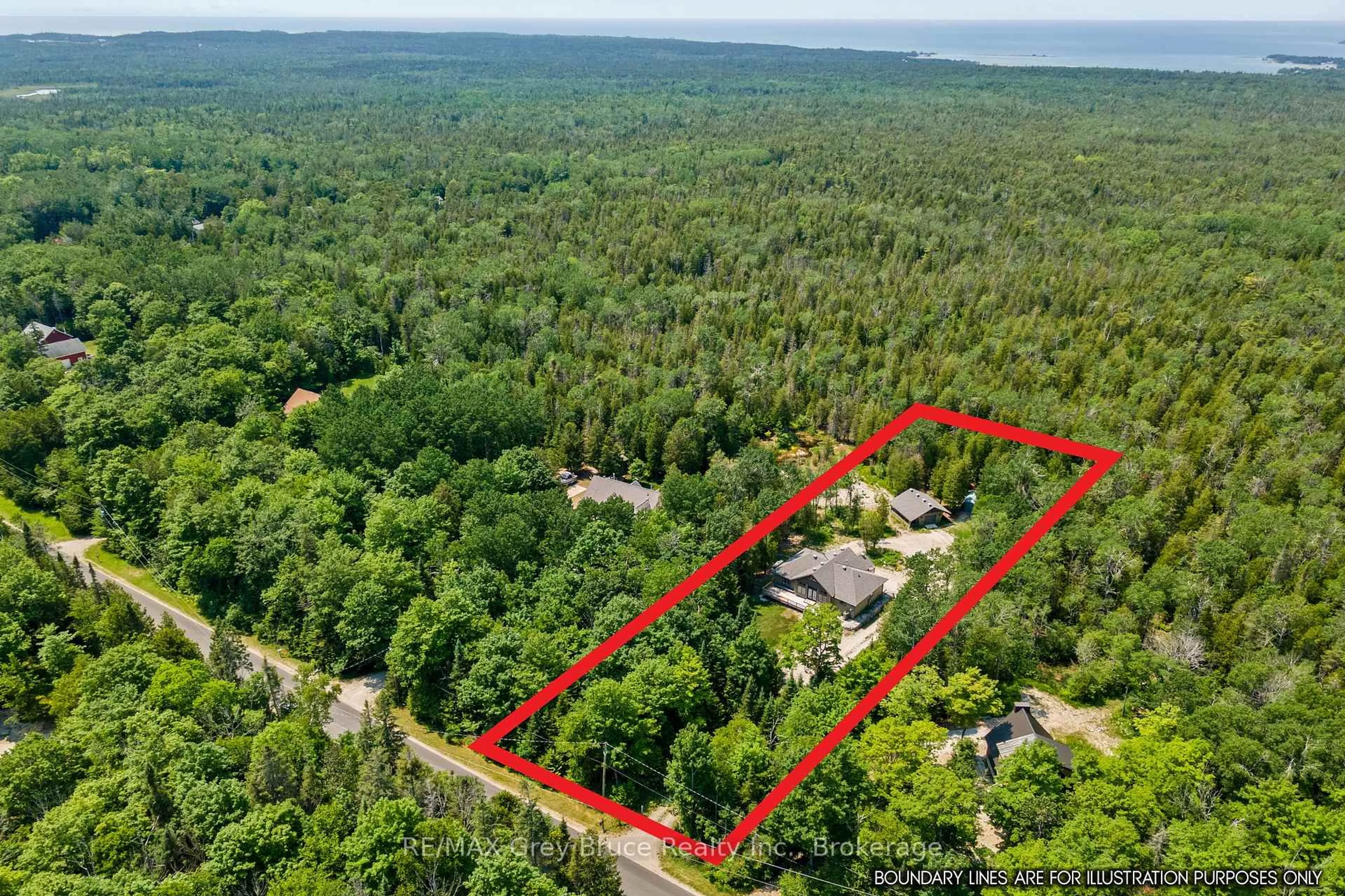 A pic from outside/outdoor area/front of a property/back of a property/a pic from drone, forest/trees view for 170 Cape Hurd Rd, Northern Bruce Peninsula Ontario N0H 2R0