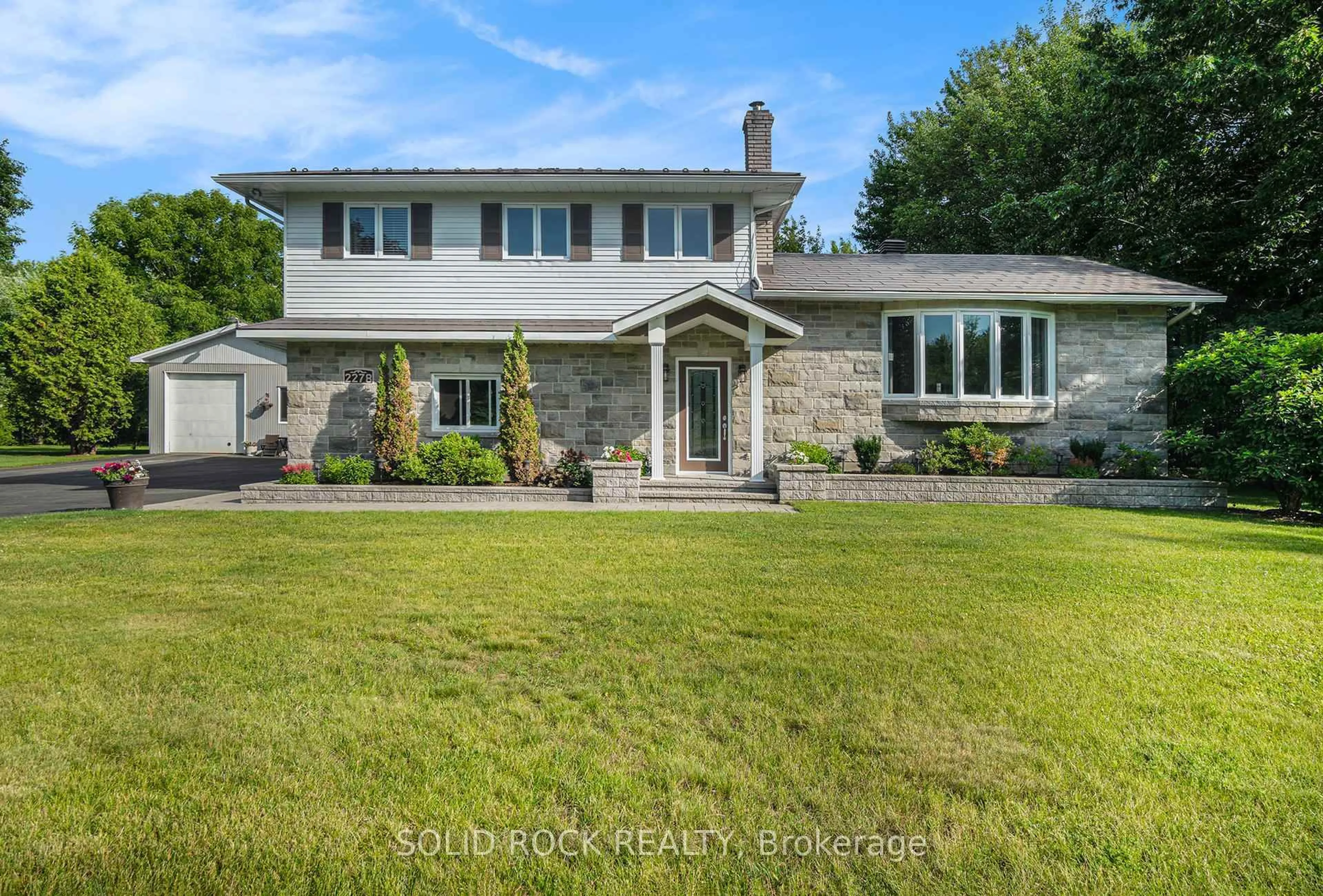 A pic from outside/outdoor area/front of a property/back of a property/a pic from drone, unknown for 2278 russland Rd, Russell Ontario K0A 3H0