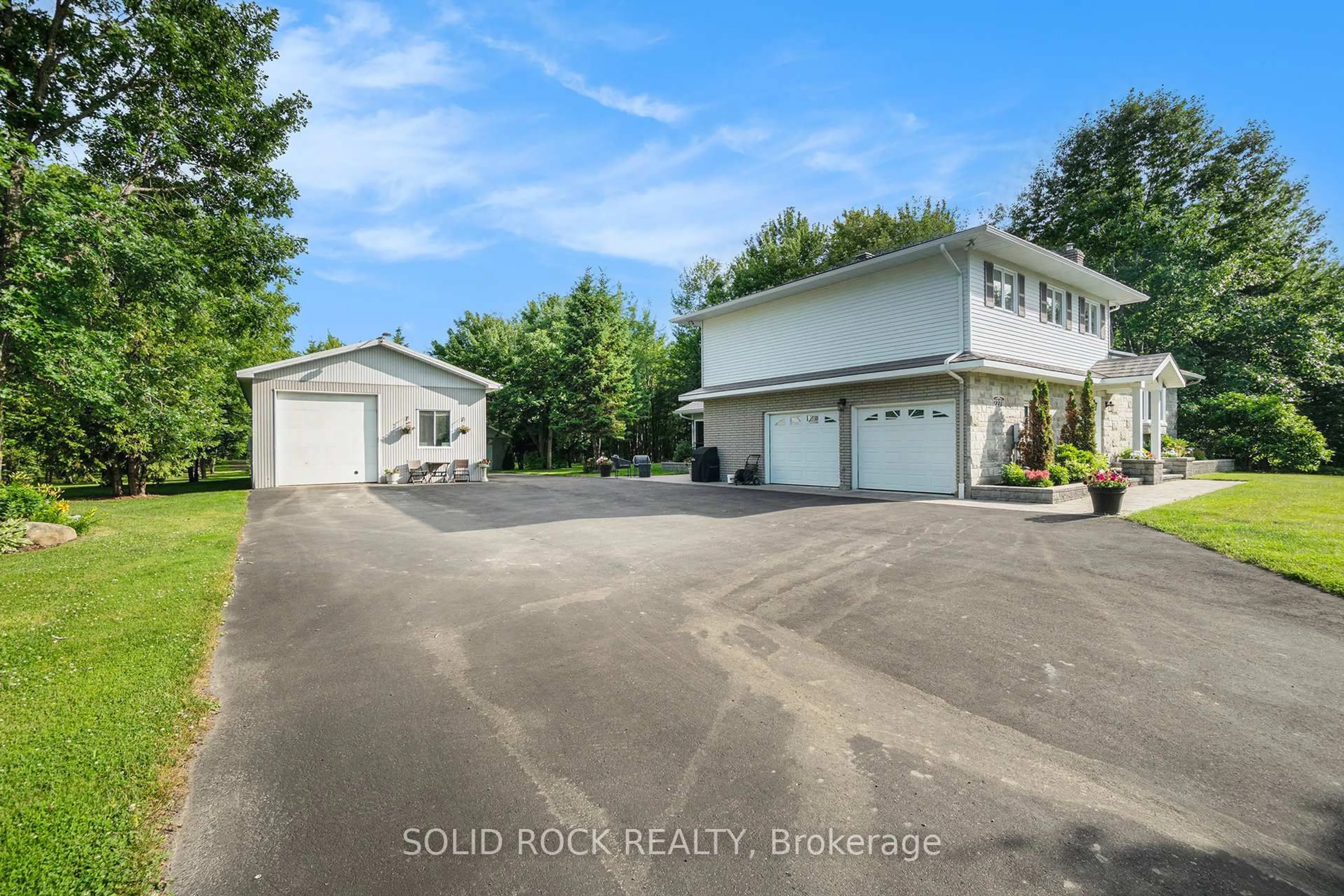 A pic from outside/outdoor area/front of a property/back of a property/a pic from drone, water/lake/river/ocean view for 2278 russland Rd, Russell Ontario K0A 3H0