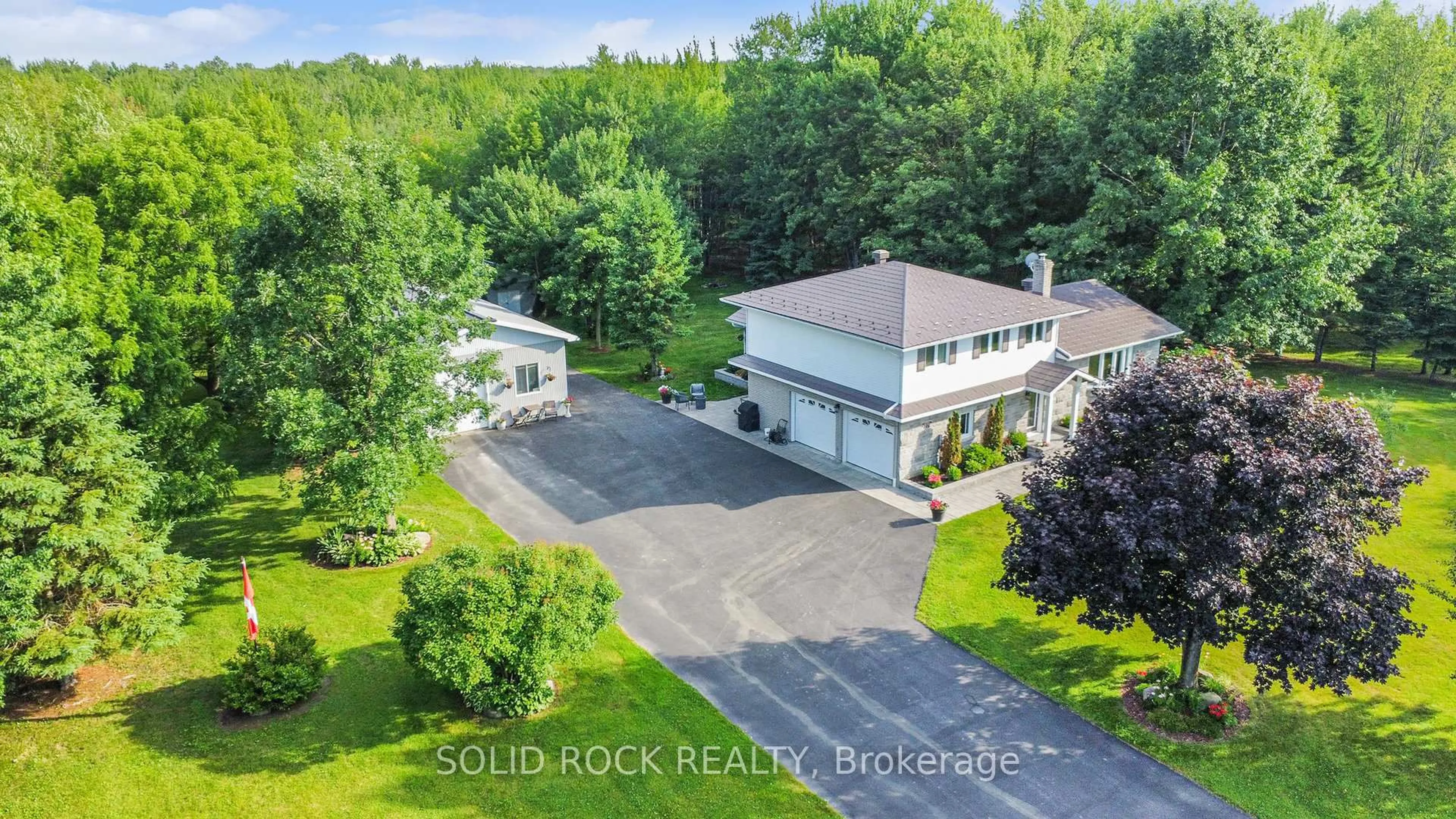 A pic from outside/outdoor area/front of a property/back of a property/a pic from drone, unknown for 2278 russland Rd, Russell Ontario K0A 3H0