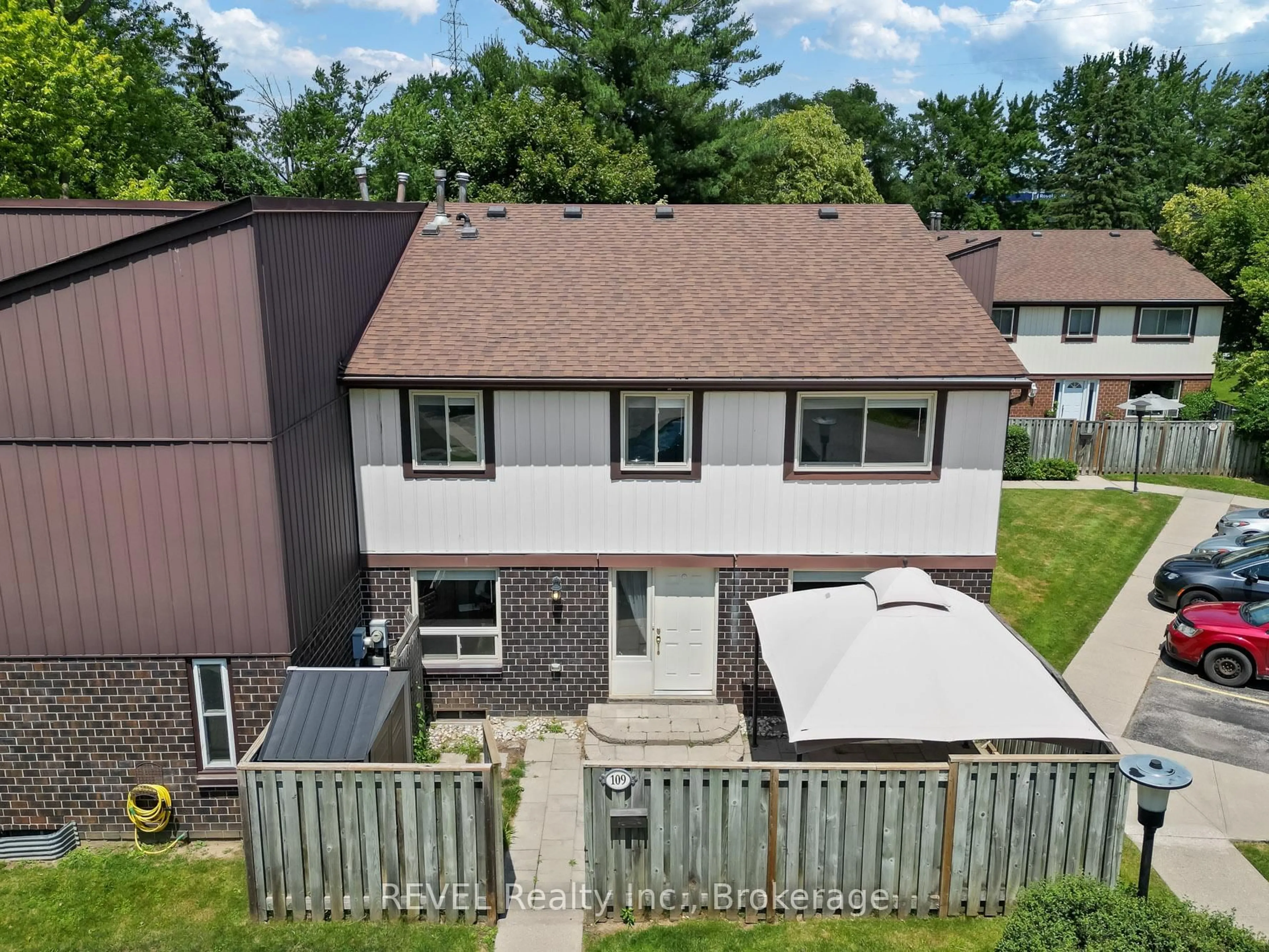 A pic from outside/outdoor area/front of a property/back of a property/a pic from drone, unknown for 45 Marksam Rd #109, Guelph Ontario N1H 6Y9