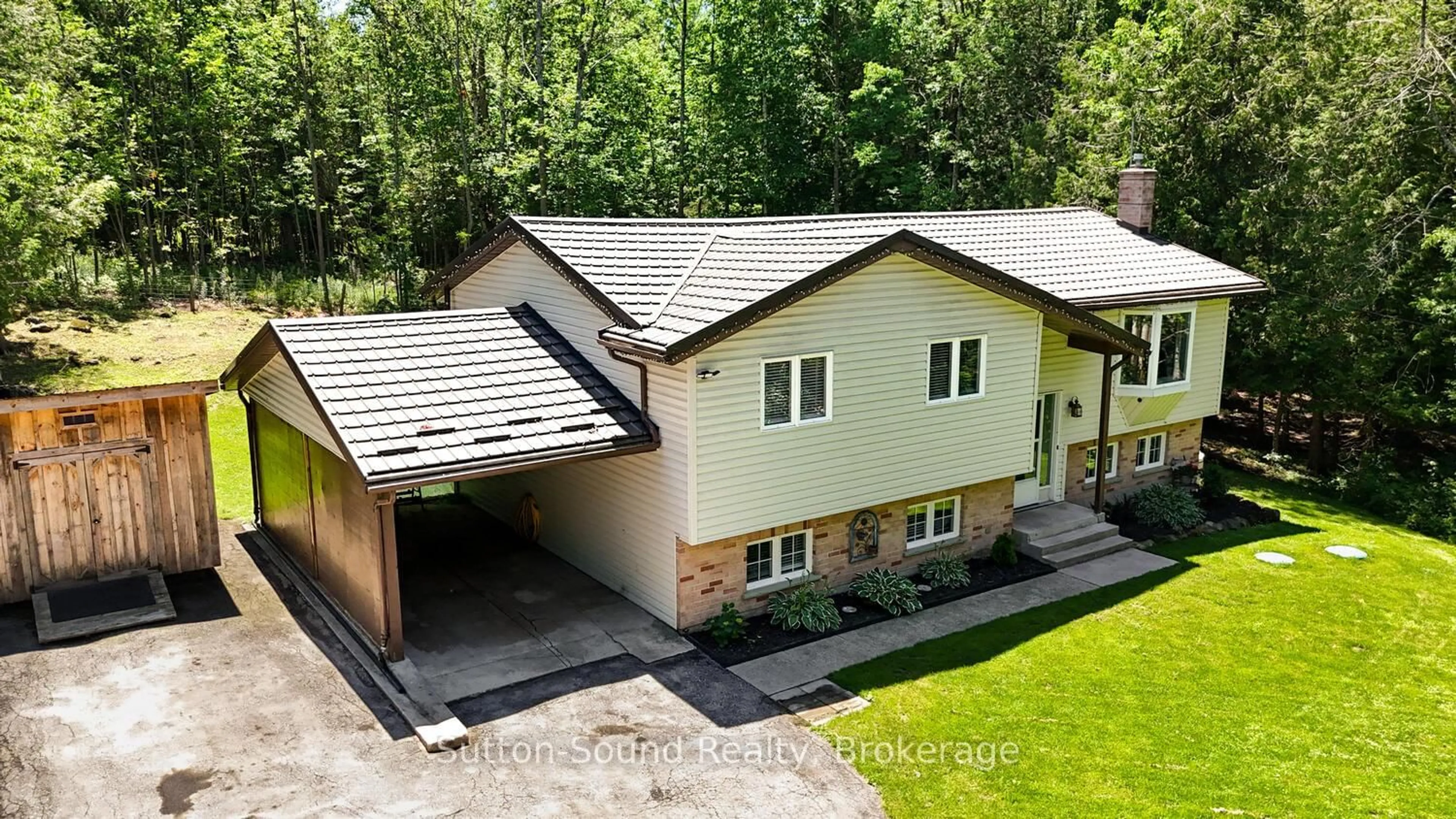 A pic from outside/outdoor area/front of a property/back of a property/a pic from drone, unknown for 222416 Derby Keppel Tline Townline, Georgian Bluffs Ontario N4K 5N7