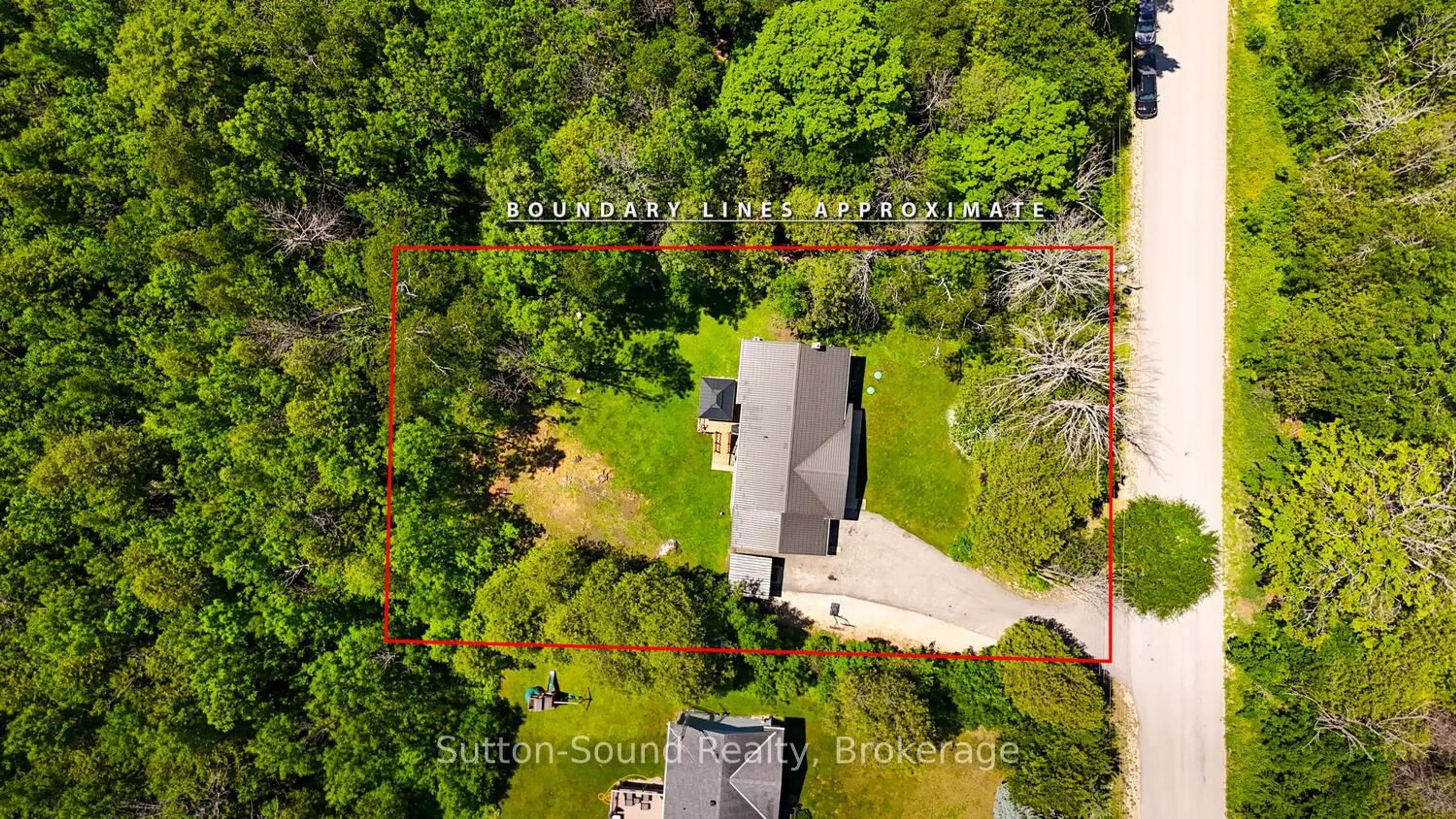 A pic from outside/outdoor area/front of a property/back of a property/a pic from drone, forest/trees view for 222416 Derby Keppel Tline Townline, Georgian Bluffs Ontario N4K 5N7