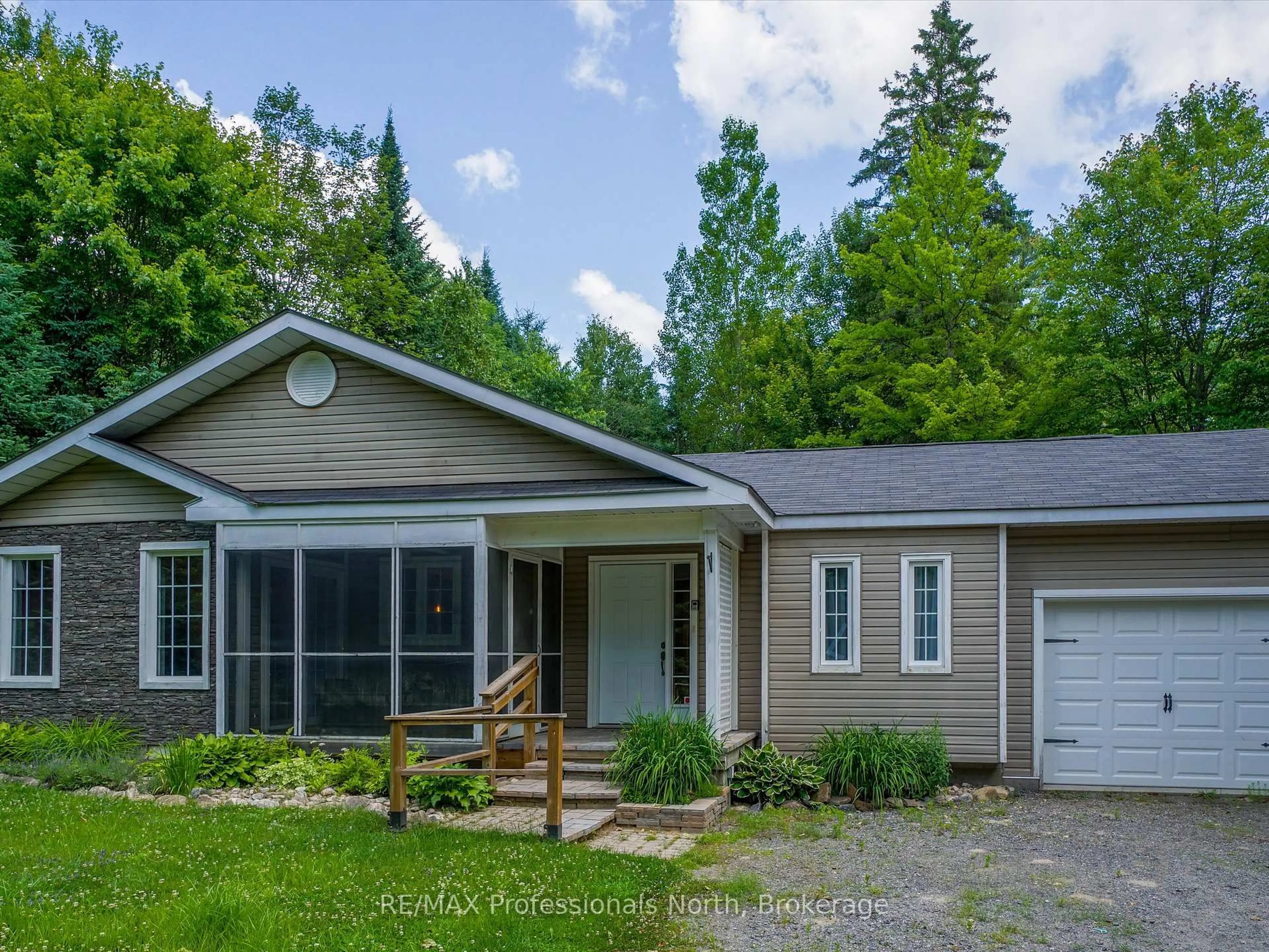 Home with vinyl exterior material, street for 149 Balsam Chutes Rd, Huntsville Ontario P0B 1L0