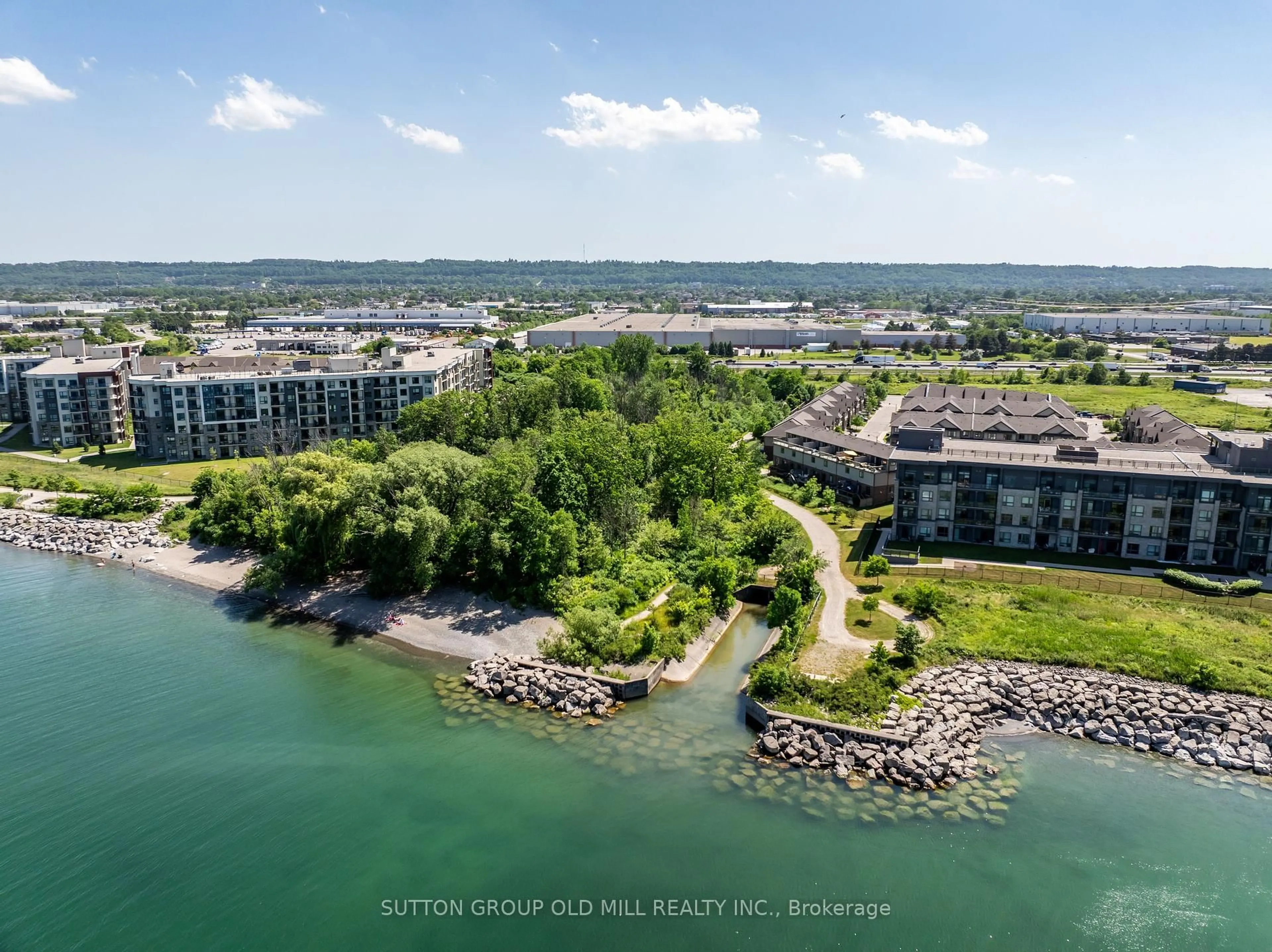 A pic from outside/outdoor area/front of a property/back of a property/a pic from drone, water/lake/river/ocean view for 53 Southshore Cres, Hamilton Ontario L8E 0J3